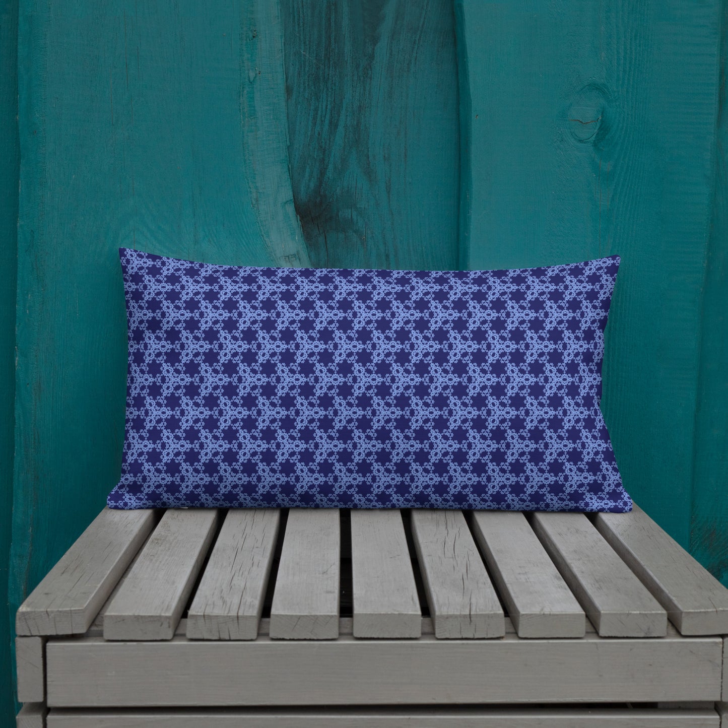 20″×12″ premium throw pillow with the 'Triagon' navy and blue geometric pattern shown in a lifestyle setting.