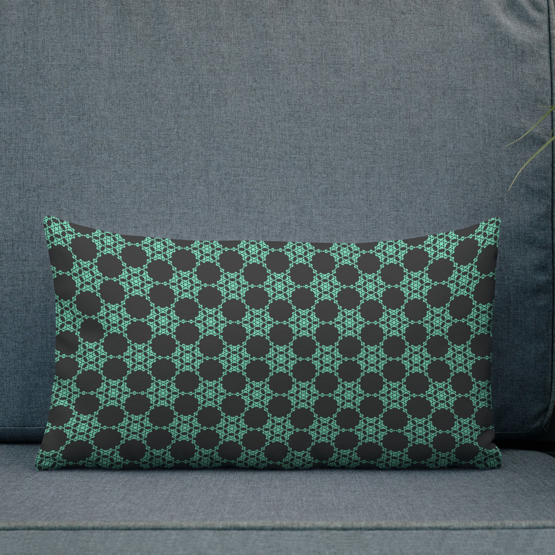 20″×12″ premium throw pillow with the 'Flowers Victory' charcoal and mint geometric pattern shown in a lifestyle setting.
