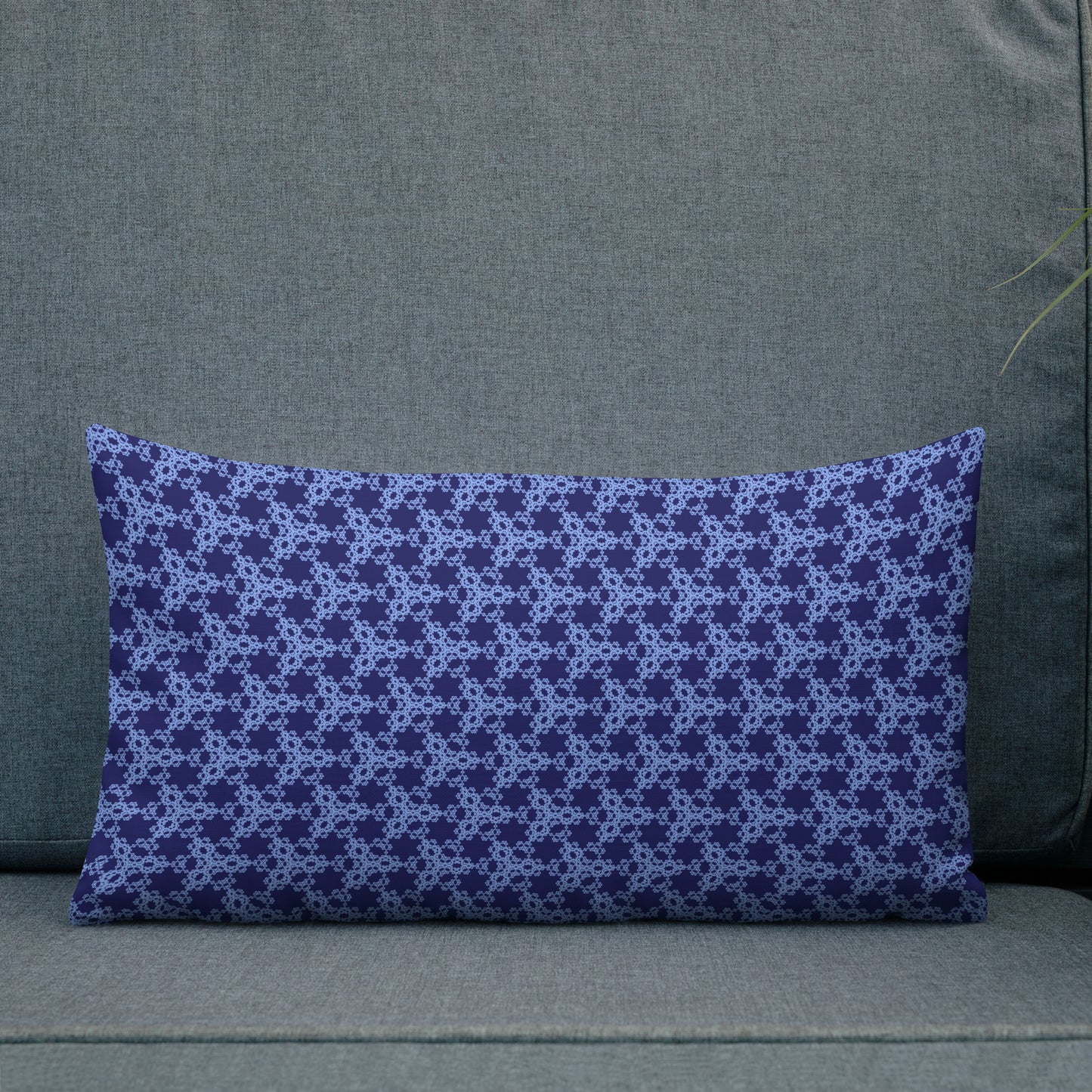 20″×12″ premium throw pillow with the 'Triagon' navy and blue geometric pattern shown in a lifestyle setting.