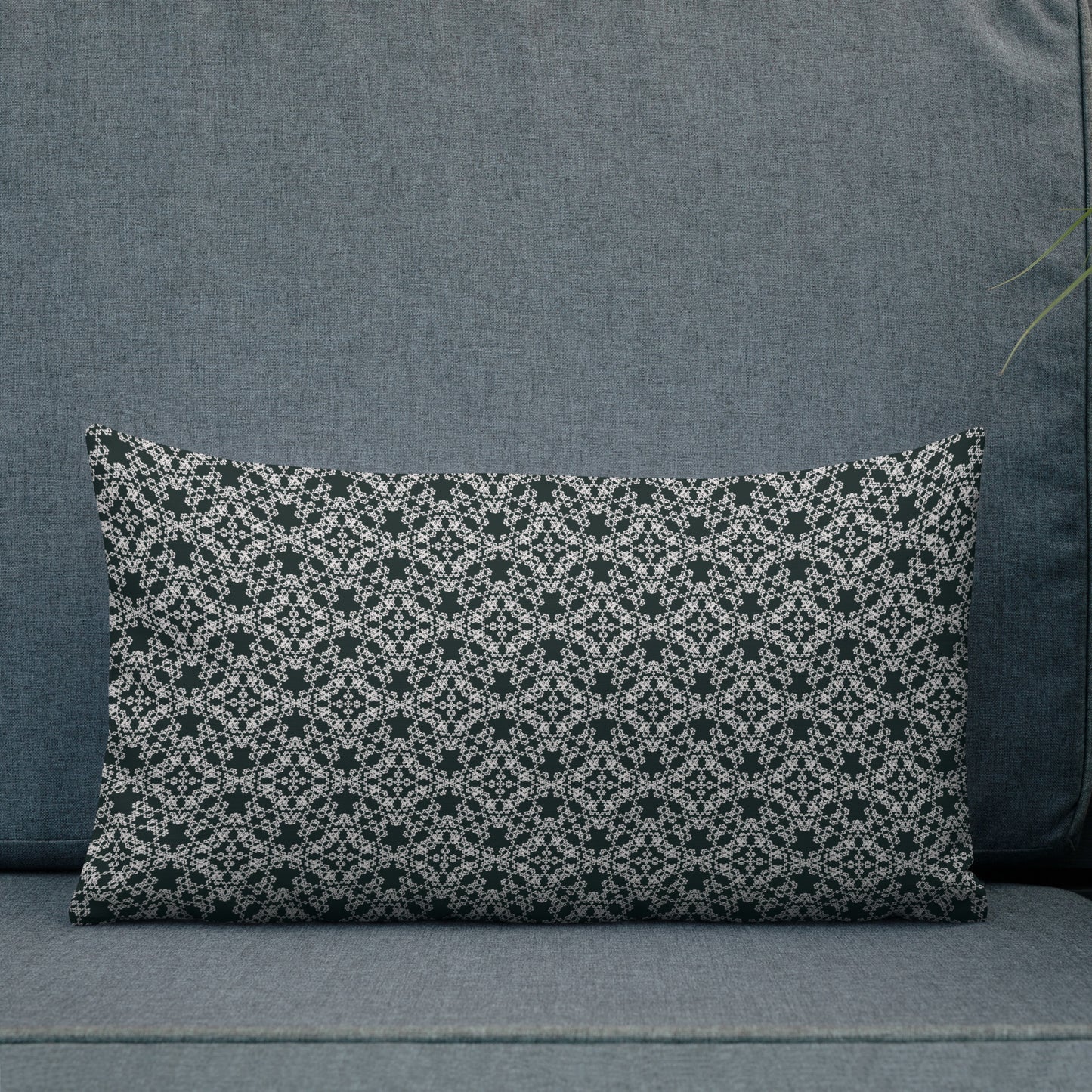 20″×12″ premium throw pillow with the 'Tetragon' charcoal and white geometric pattern shown in a lifestyle setting.