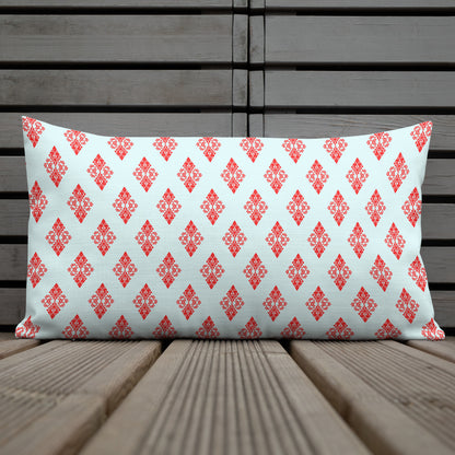 20″×12″ premium throw pillow with the 'Digon' sky blue and red geometric pattern shown in a lifestyle setting.