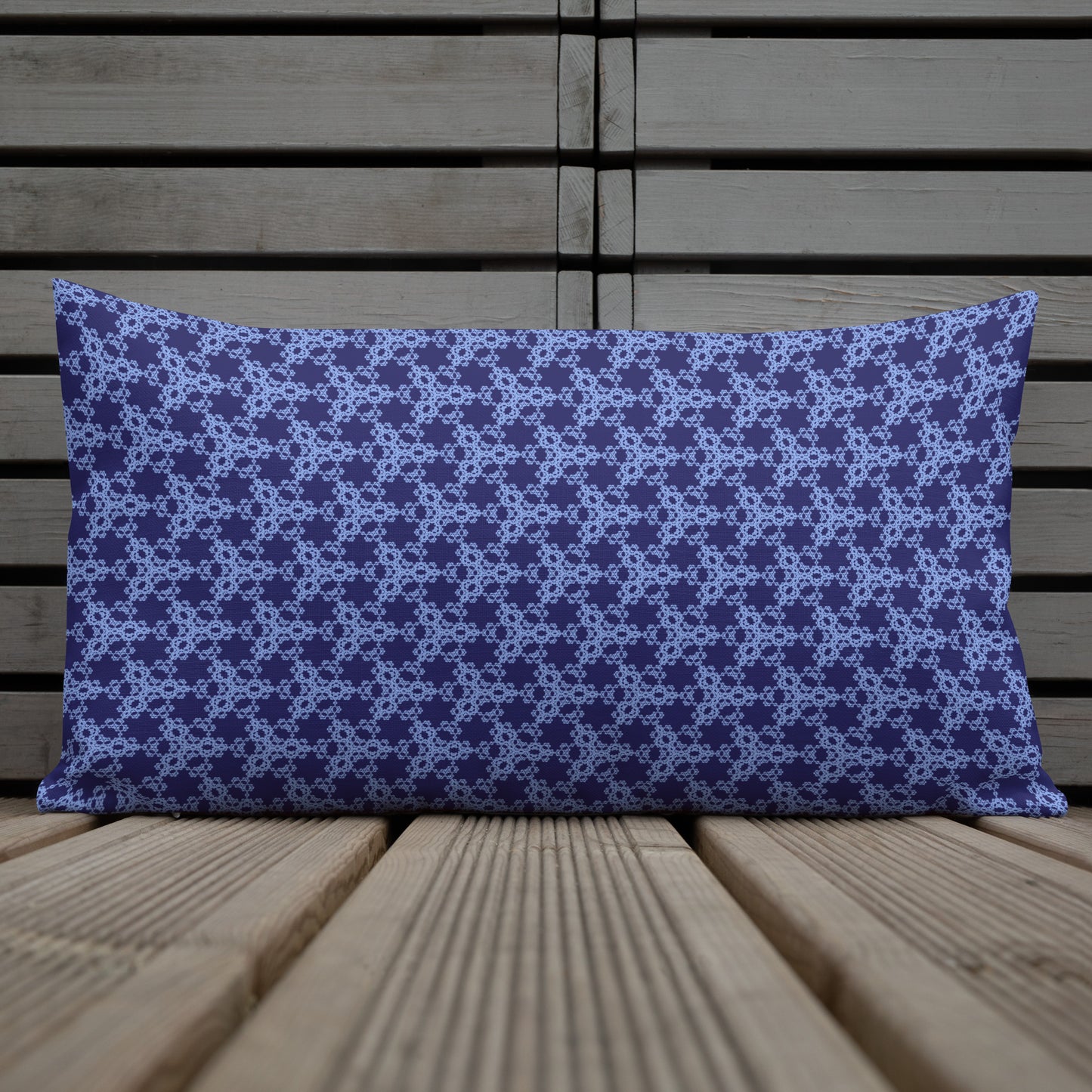 20″×12″ premium throw pillow with the 'Triagon' navy and blue geometric pattern shown in a lifestyle setting.