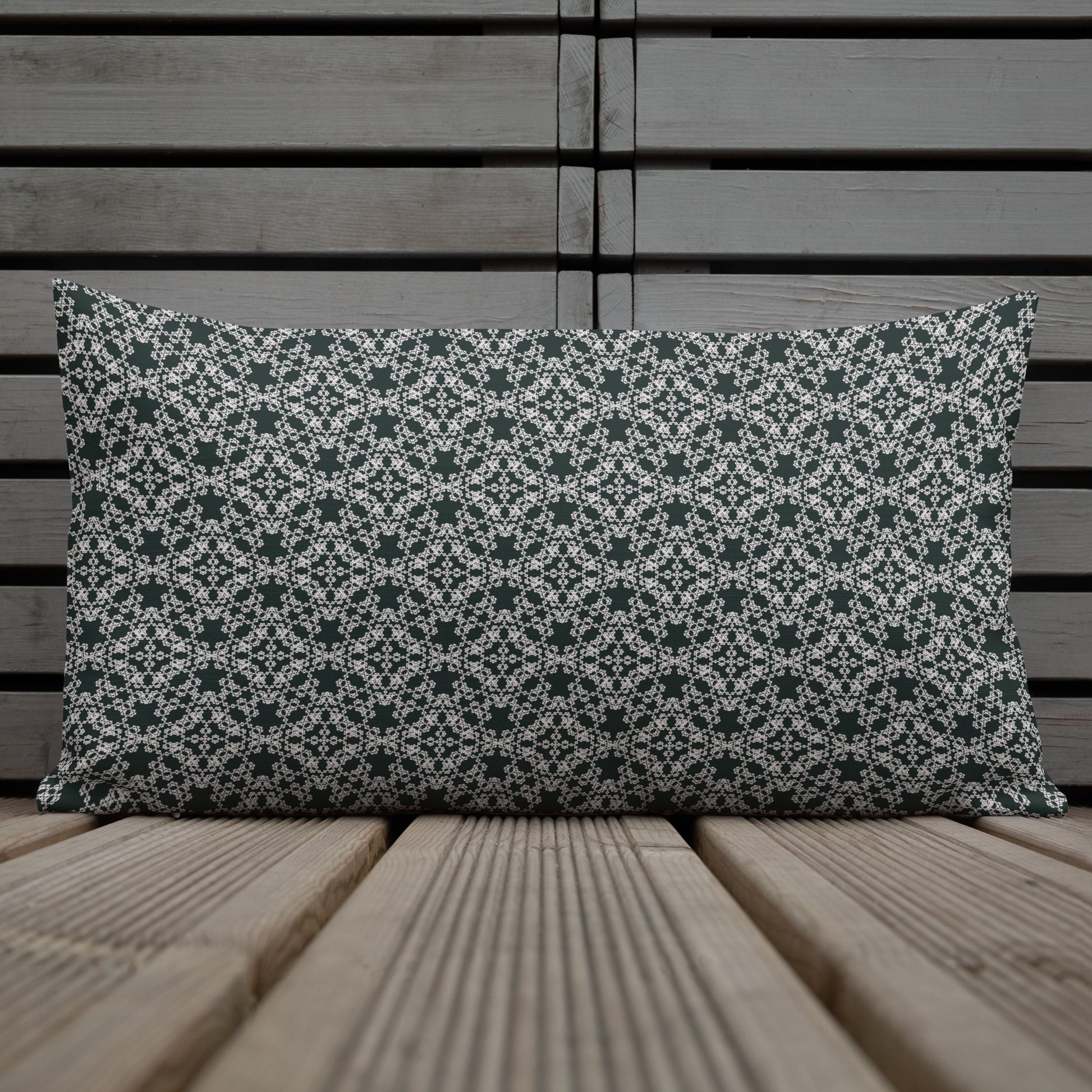 20″×12″ premium throw pillow with the 'Tetragon' charcoal and white geometric pattern shown in a lifestyle setting.