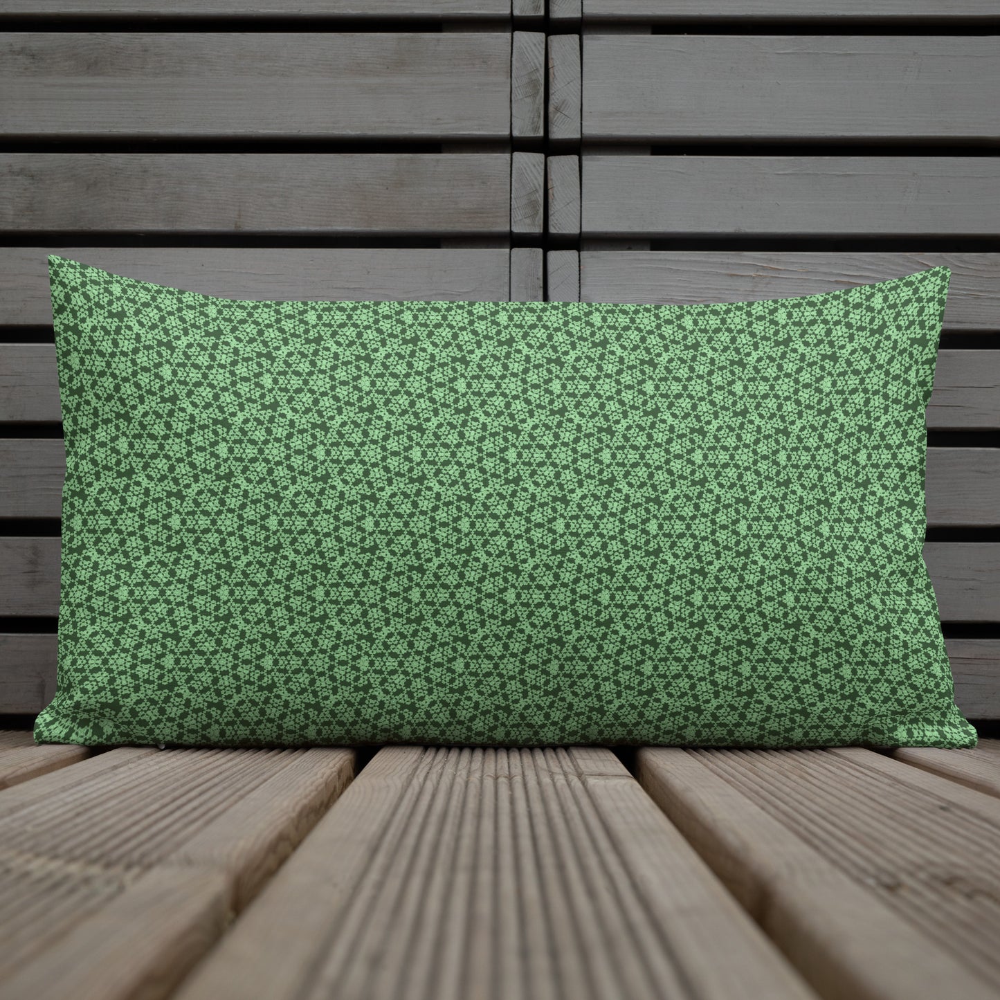 20″×12″ premium throw pillow with the 'Heptagon' green geometric pattern shown in a lifestyle setting.