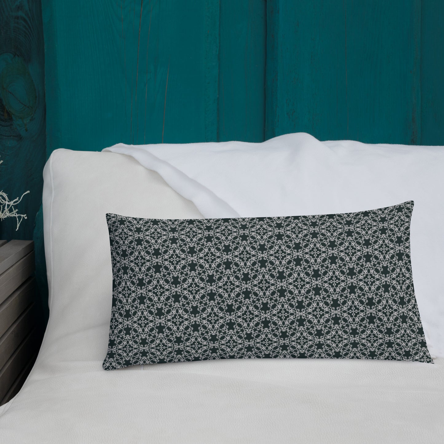 20″×12″ premium throw pillow with the 'Tetragon' charcoal and white geometric pattern shown in a lifestyle setting.