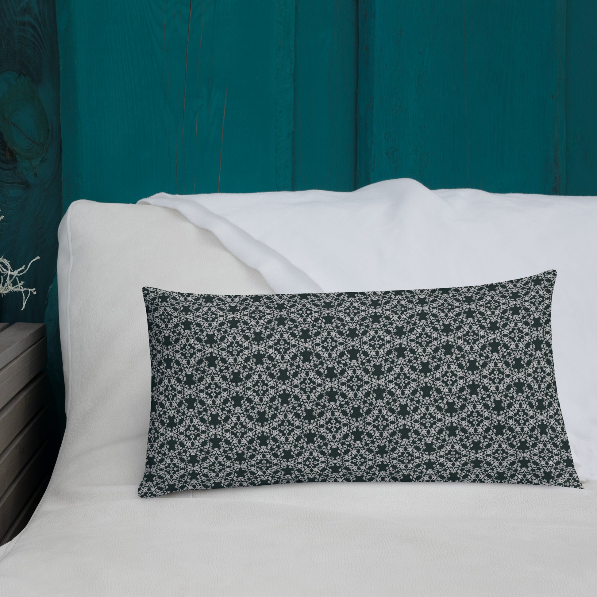 20″×12″ premium throw pillow with the 'Tetragon' charcoal and white geometric pattern shown in a lifestyle setting.
