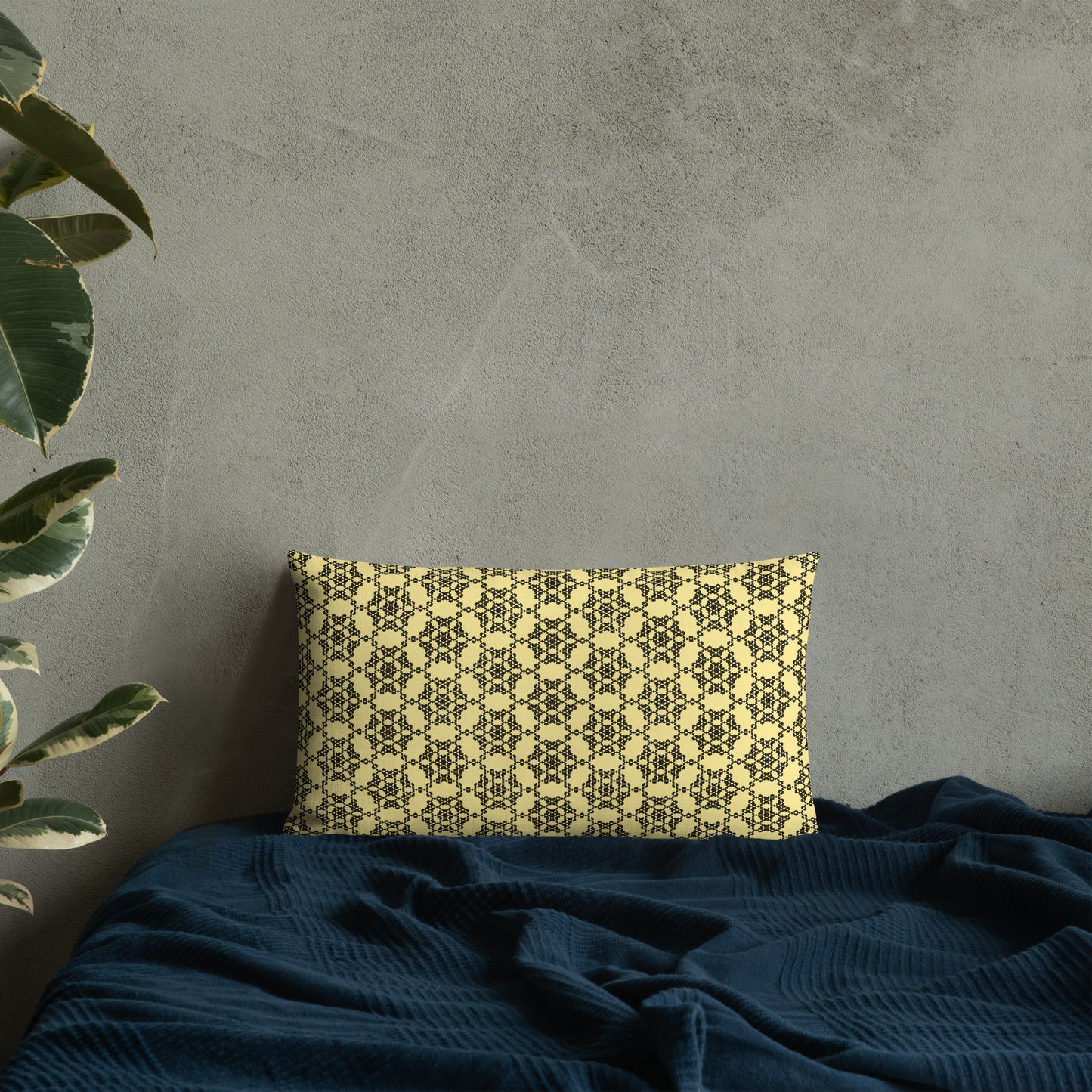 20″×12″ premium throw pillow with the 'Hexagon' yellow and black geometric pattern on a bed.