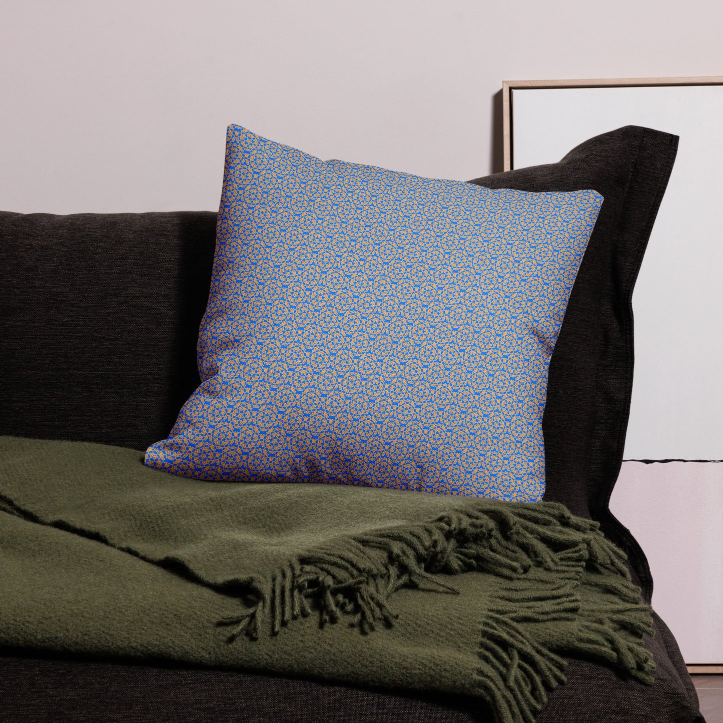 22″×22″ premium throw pillow with the 'Pentagon' blue and yellow geometric pattern on a couch.