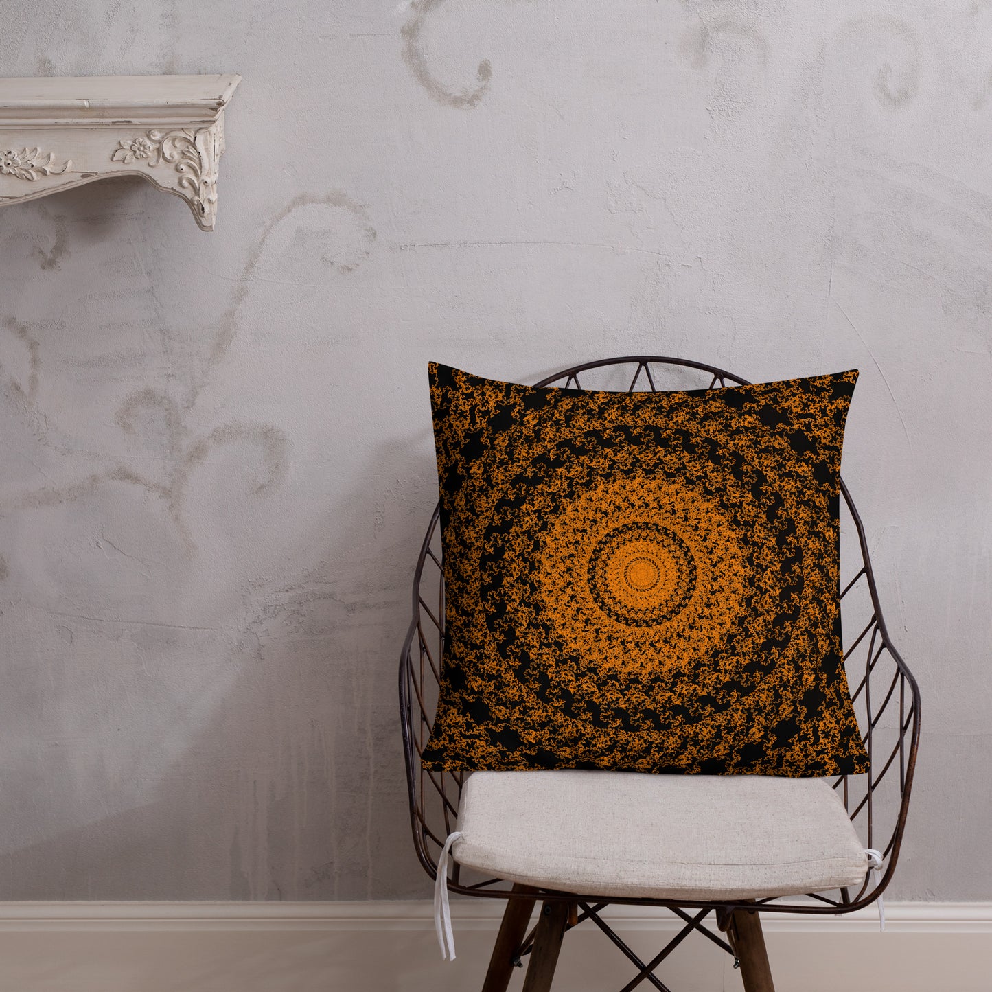 22″×22″ premium throw pillow with the 'The Sun' orange and black geometric design shown in a lifestyle setting.