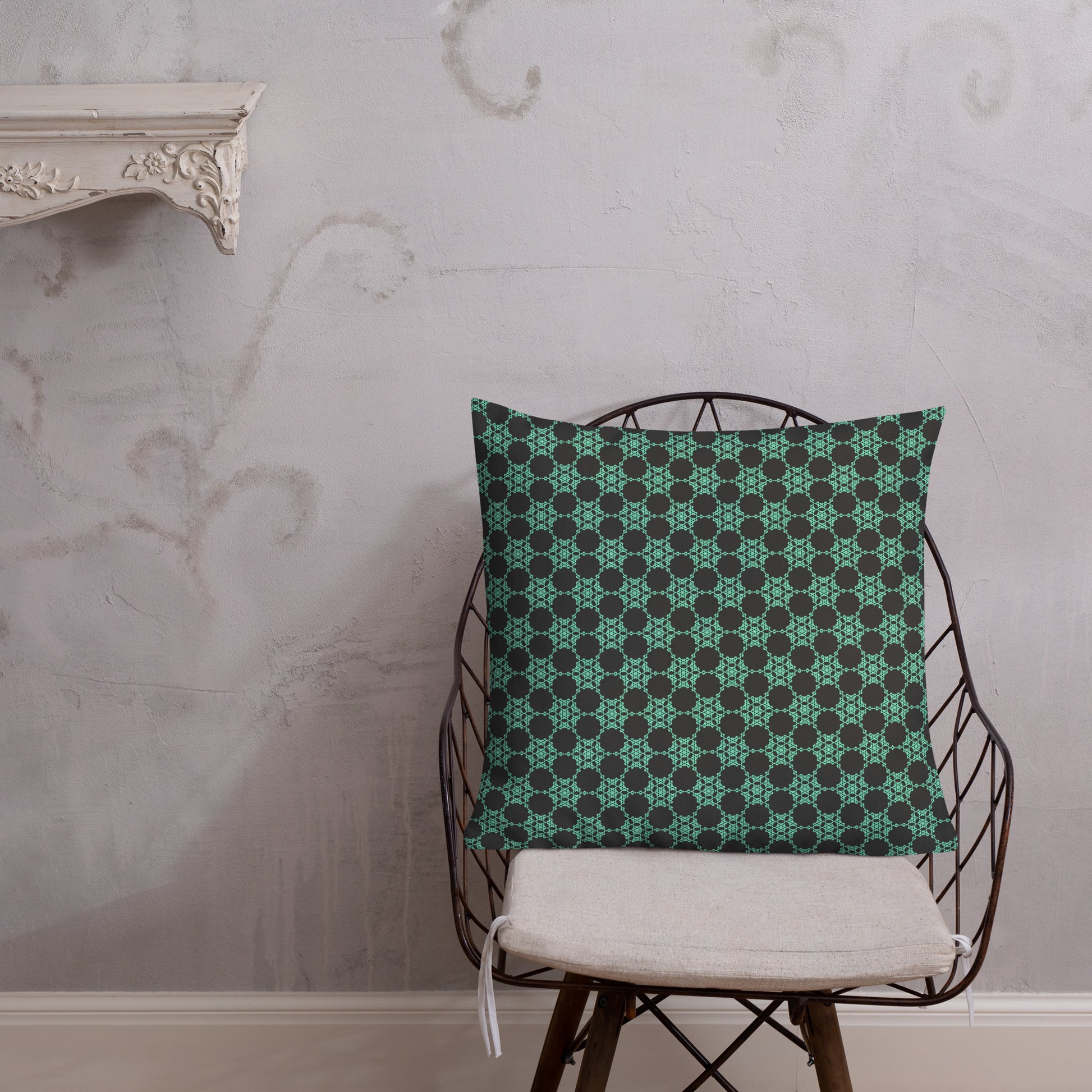 22″×22″ premium throw pillow with the 'Flowers Victory' charcoal and mint geometric pattern shown in a lifestyle setting.