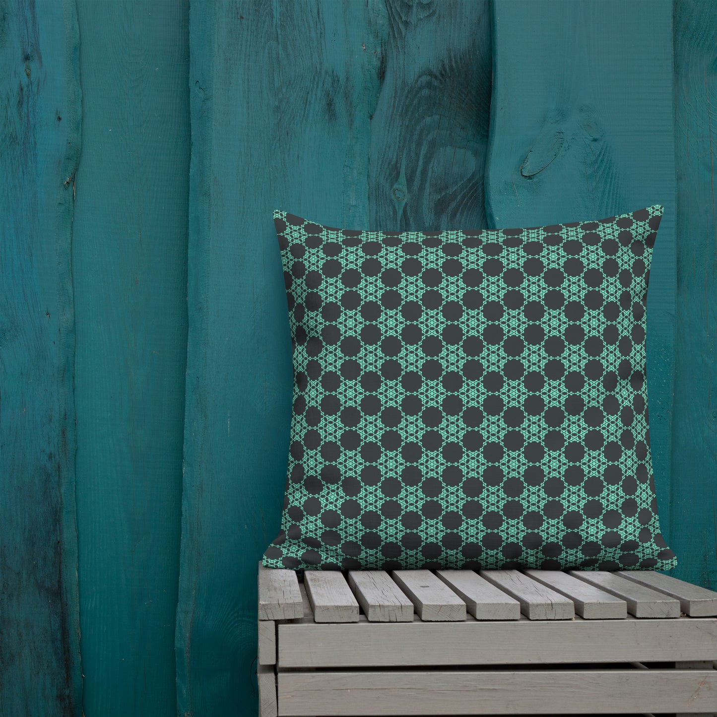 22″×22″ premium throw pillow with the 'Flowers Victory' charcoal and mint geometric pattern shown in a lifestyle setting.