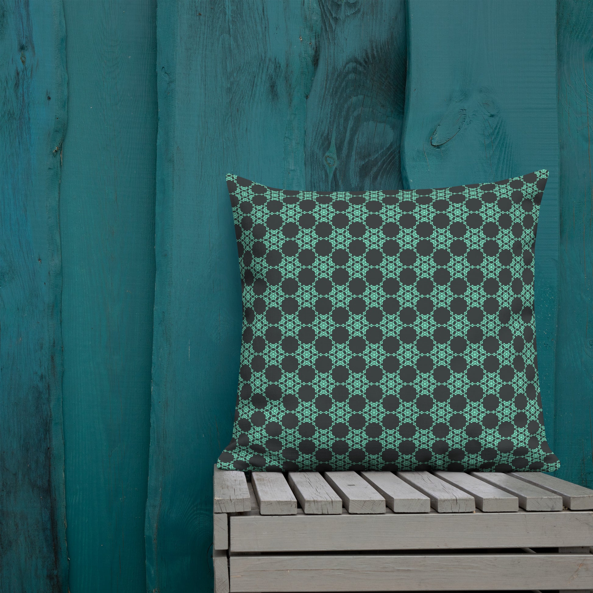 22″×22″ premium throw pillow with the 'Flowers Victory' charcoal and mint geometric pattern shown in a lifestyle setting.
