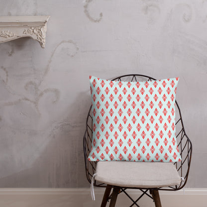 22″×22″ premium throw pillow with the 'Digon' sky blue and red geometric pattern shown in a lifestyle setting.