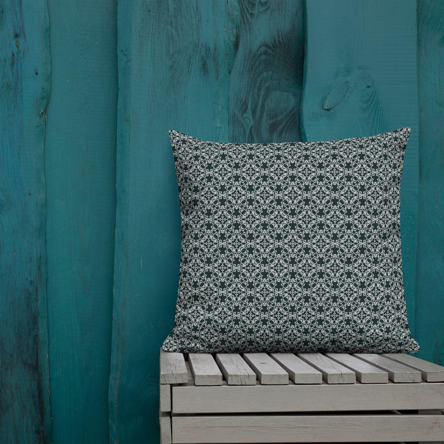 22″×22″ premium throw pillow with the 'Tetragon' charcoal and white geometric pattern shown in a lifestyle setting.