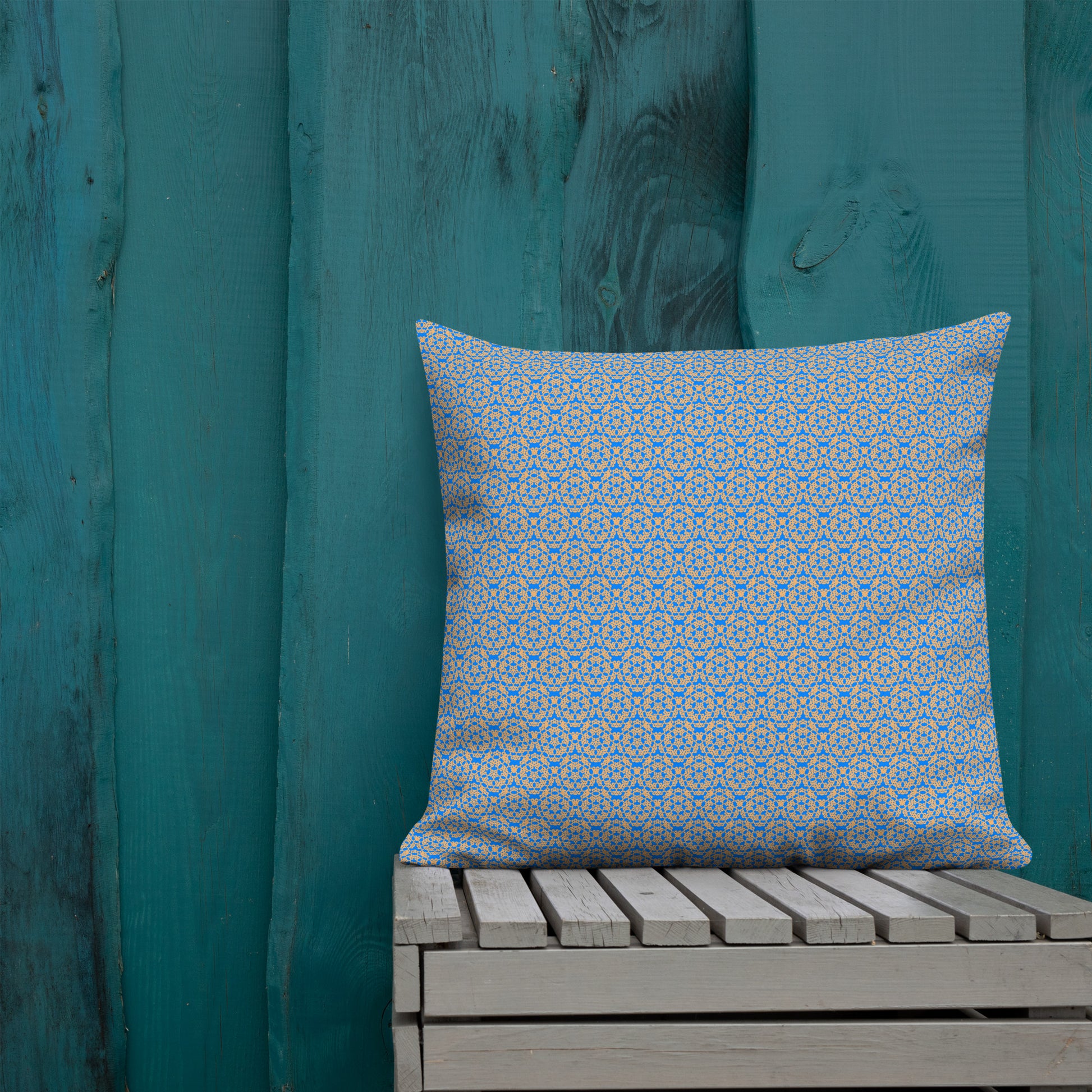 22″×22″ premium throw pillow with the 'Pentagon' blue and yellow geometric pattern shown in a lifestyle setting.