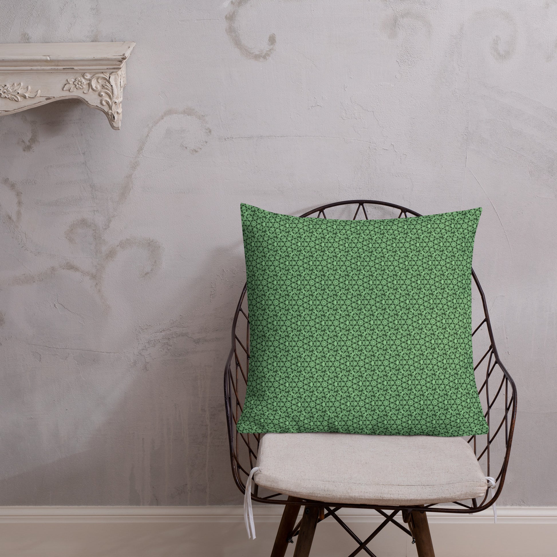 22″×22″ premium throw pillow with the 'Heptagon' green geometric pattern shown in a lifestyle setting.