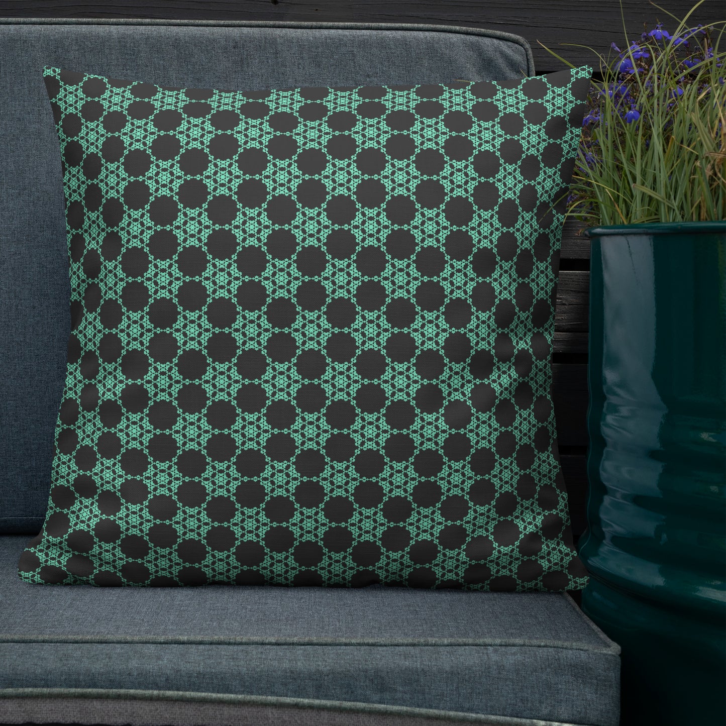 22″×22″ premium throw pillow with the 'Flowers Victory' charcoal and mint geometric pattern shown in a lifestyle setting.