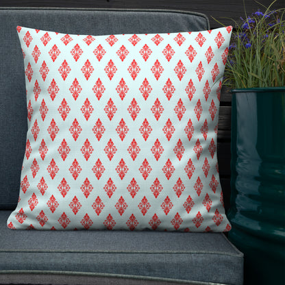 22″×22″ premium throw pillow with the 'Digon' sky blue and red geometric pattern shown in a lifestyle setting.