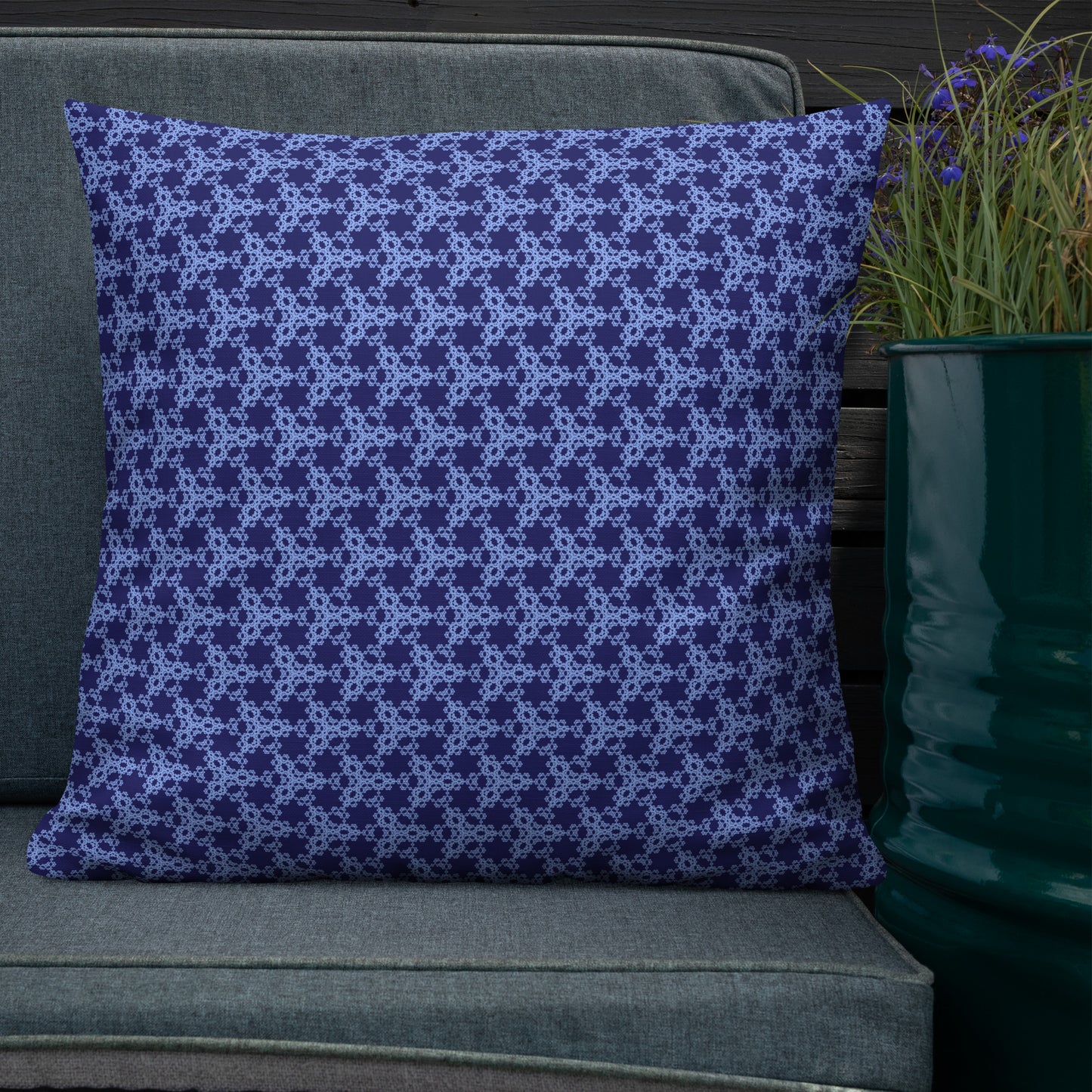 22″×22″ premium throw pillow with the 'Trigon' navy and blue geometric pattern shown in a lifestyle setting.