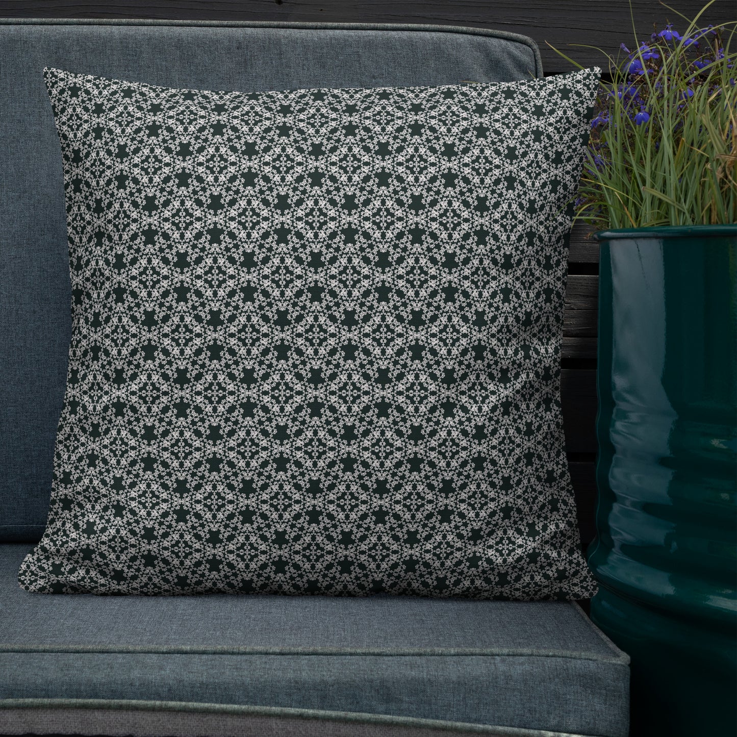 22″×22″ premium throw pillow with the 'Tetragon' charcoal and white geometric pattern shown in a lifestyle setting.