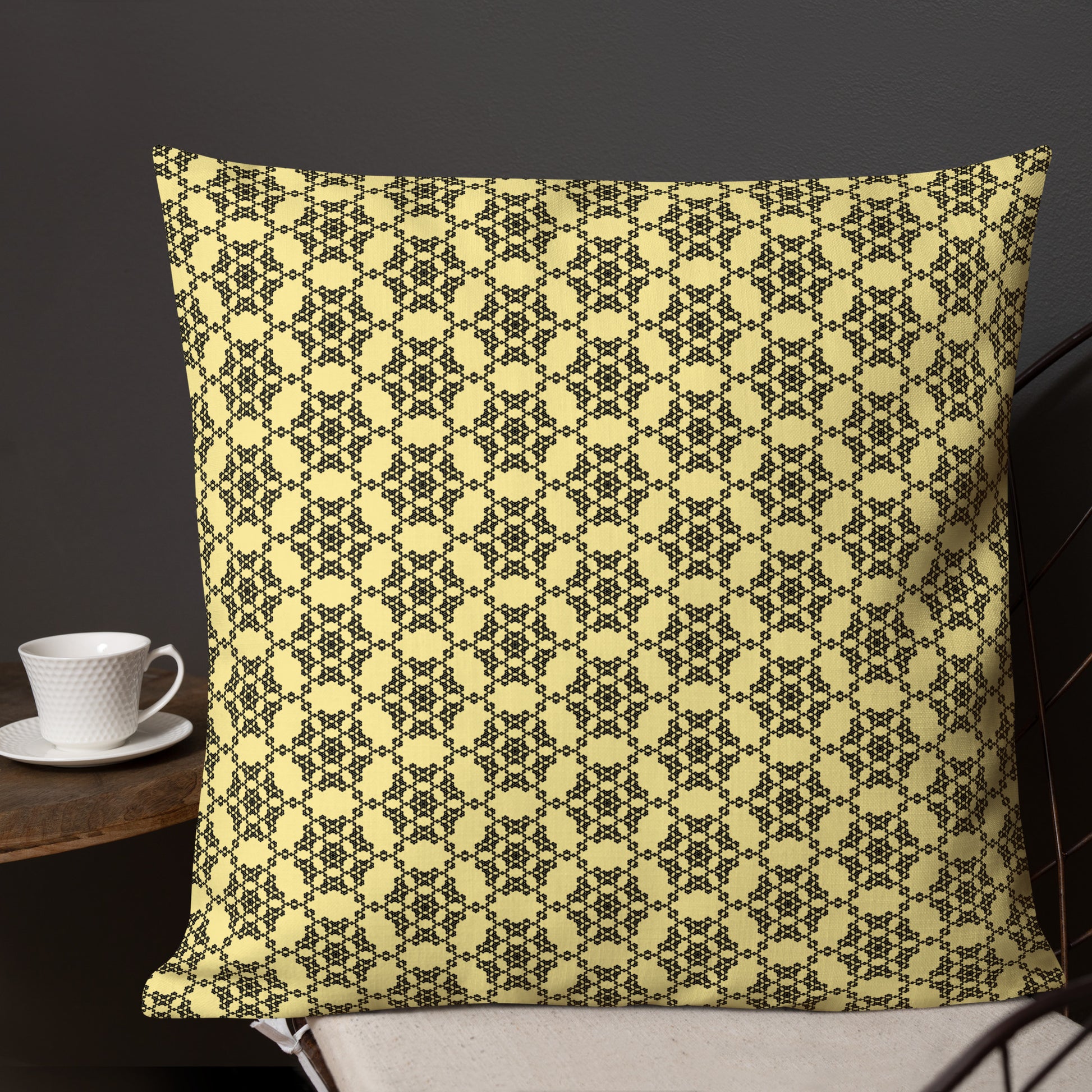 22″×22″ premium throw pillow with the 'Hexagon' yellow and black geometric pattern shown in a lifestyle setting.
