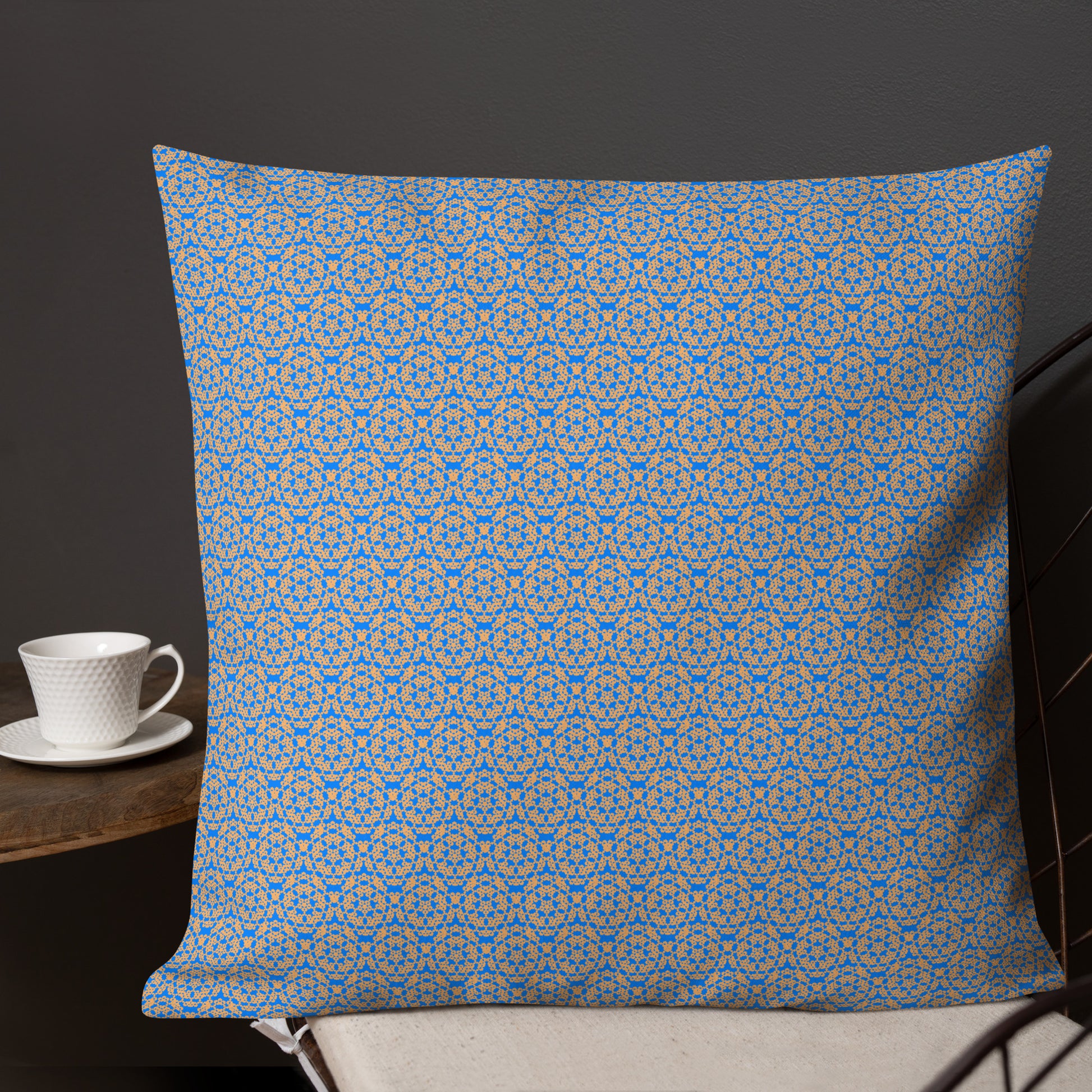 22″×22″ premium throw pillow with the 'Pentagon' blue and yellow geometric pattern shown in a lifestyle setting.