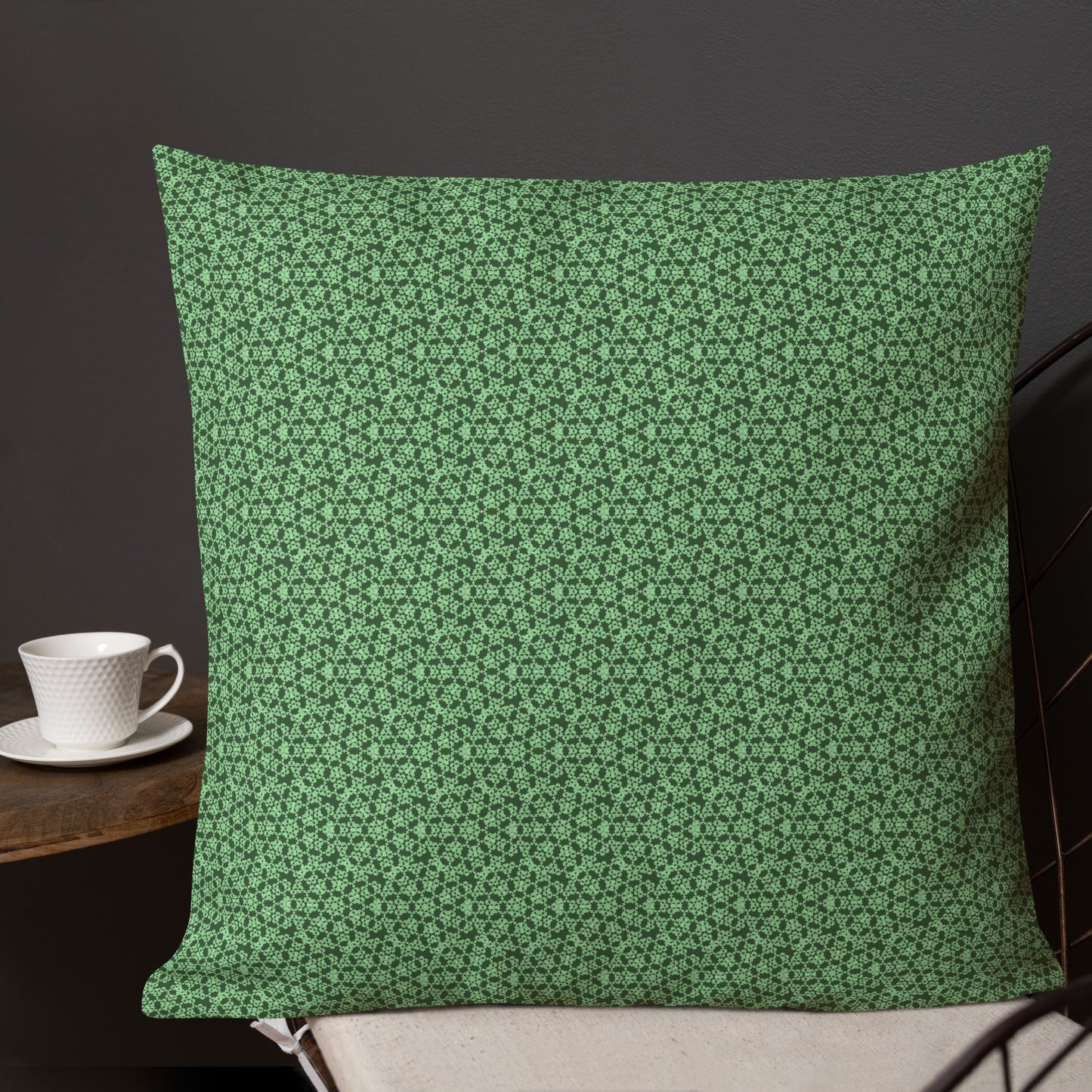 22″×22″ premium throw pillow with the 'Heptagon' green geometric pattern shown in a lifestyle setting.