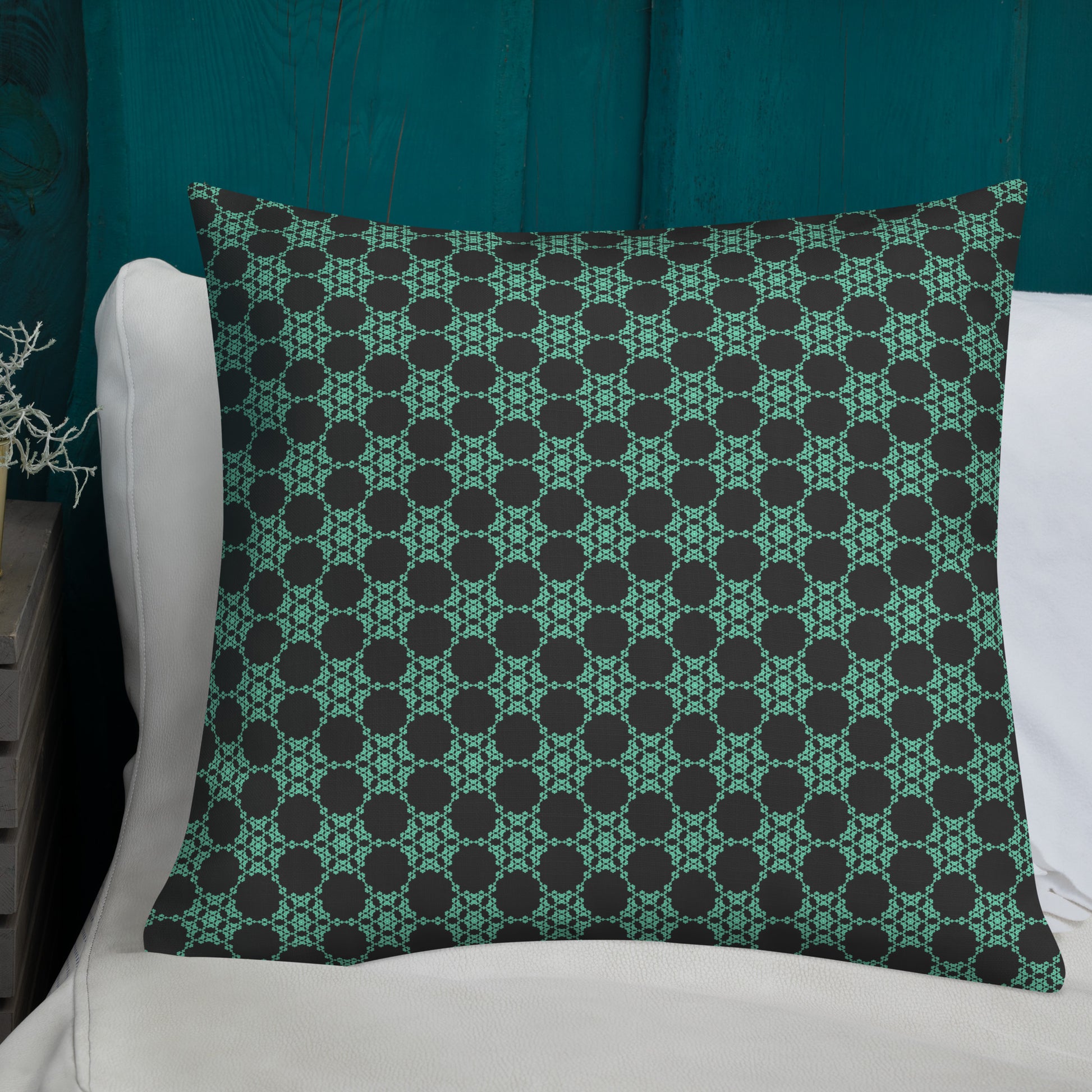 22″×22″ premium throw pillow with the 'Flowers Victory' charcoal and mint geometric pattern shown in a lifestyle setting.