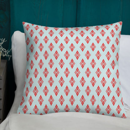 22″×22″ premium throw pillow with the 'Digon' sky blue and red geometric pattern shown in a lifestyle setting.