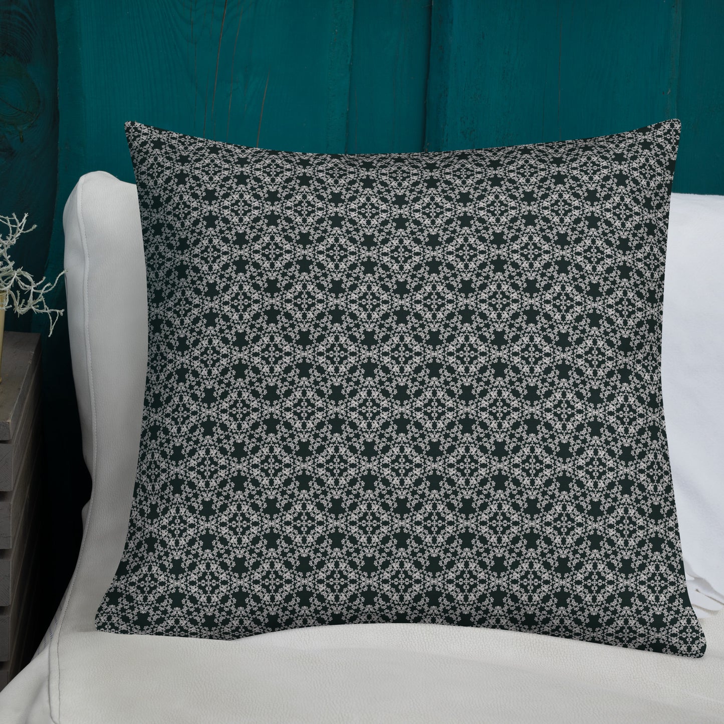 22″×22″ premium throw pillow with the 'Tetragon' charcoal and white geometric pattern shown in a lifestyle setting.
