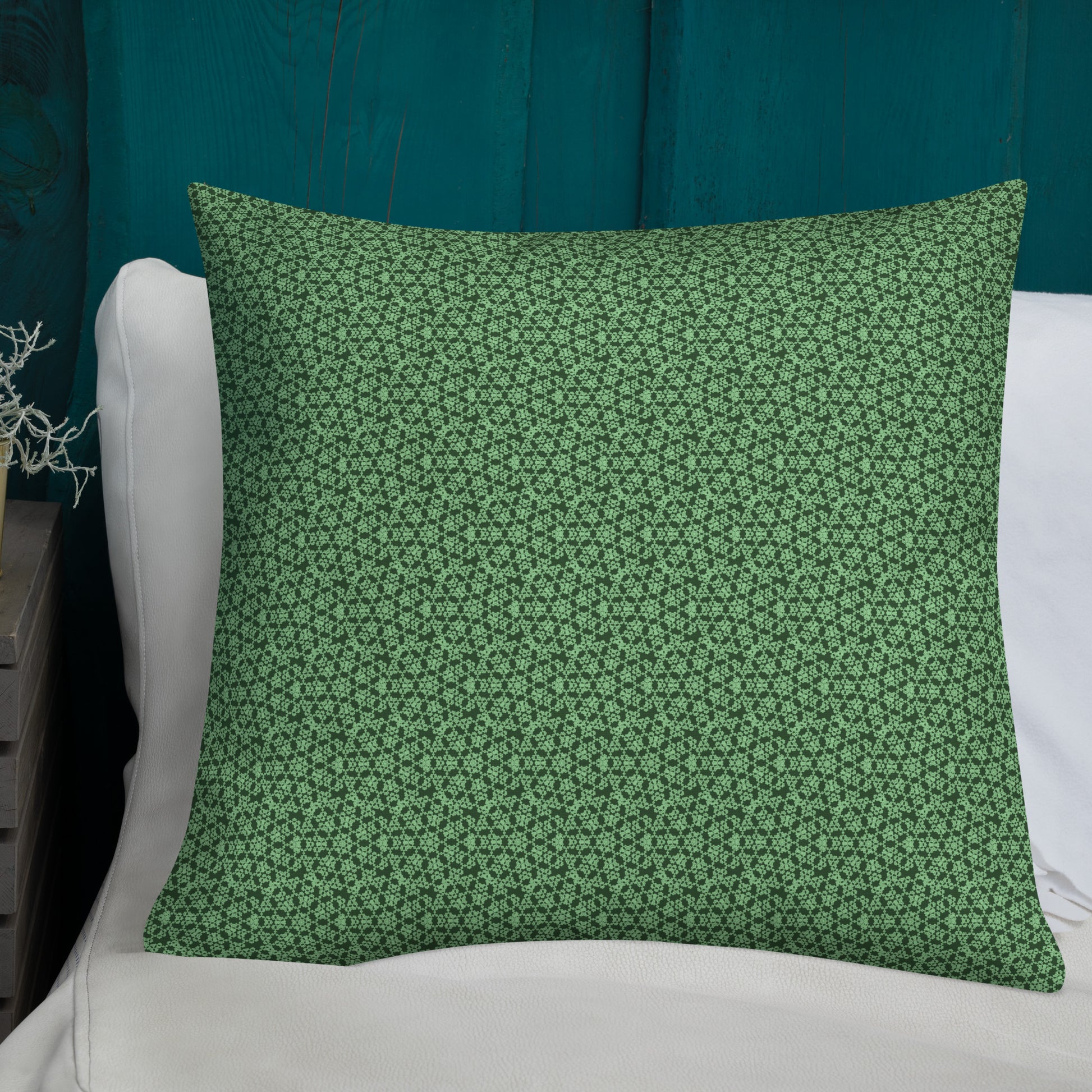 22″×22″ premium throw pillow with the 'Heptagon' green geometric pattern shown in a lifestyle setting.