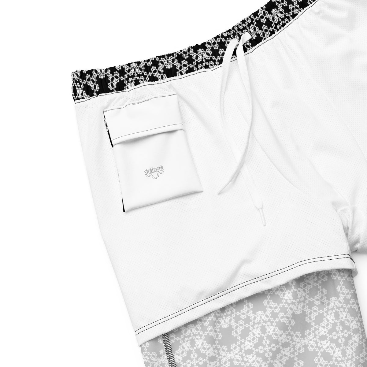 Inside lining of the swim trunks with the 'Tetragon' black and white fractal geometric pattern.