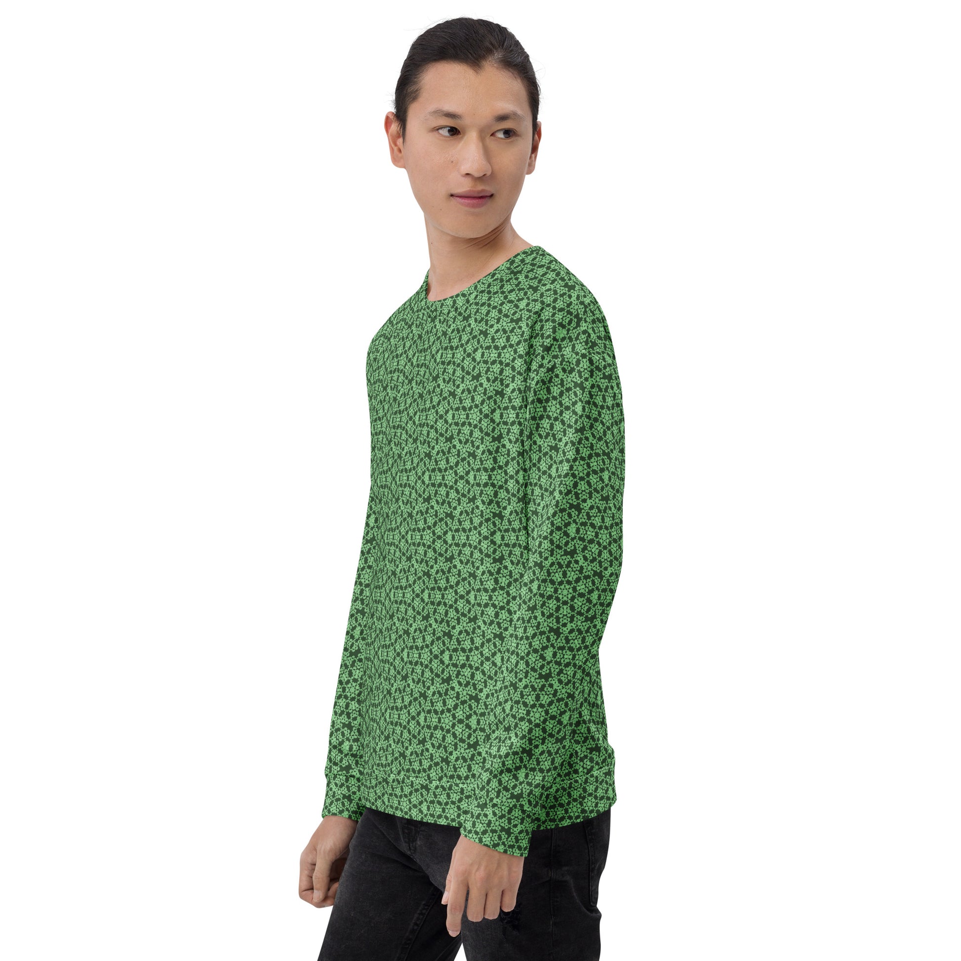 Left angle shot of a model wearing the unisex sweatshirt with the 'Heptagon' green fractal geometric pattern.