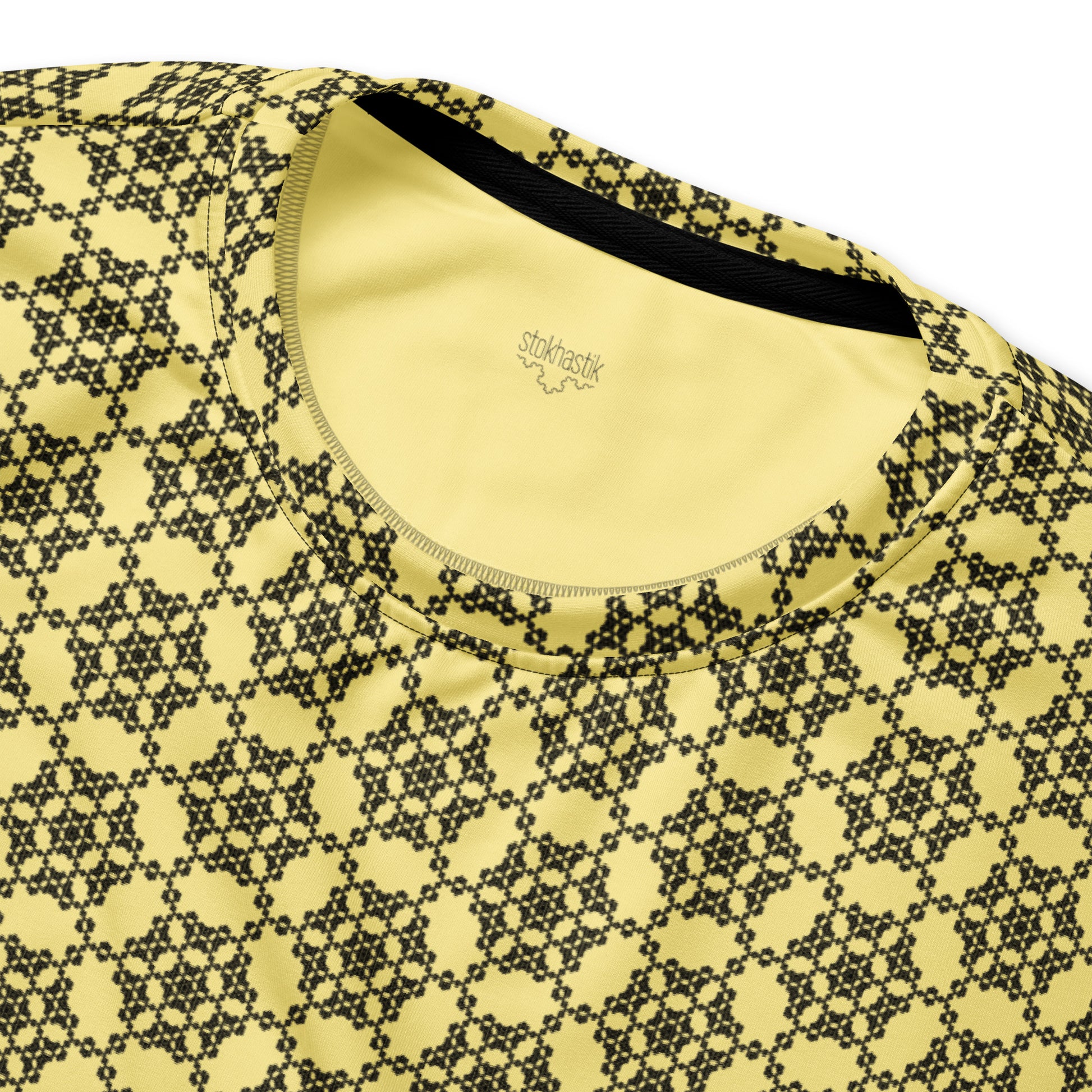 Inside label of the unisex sweatshirt with the 'Hexagon' yellow and black fractal geometric pattern.