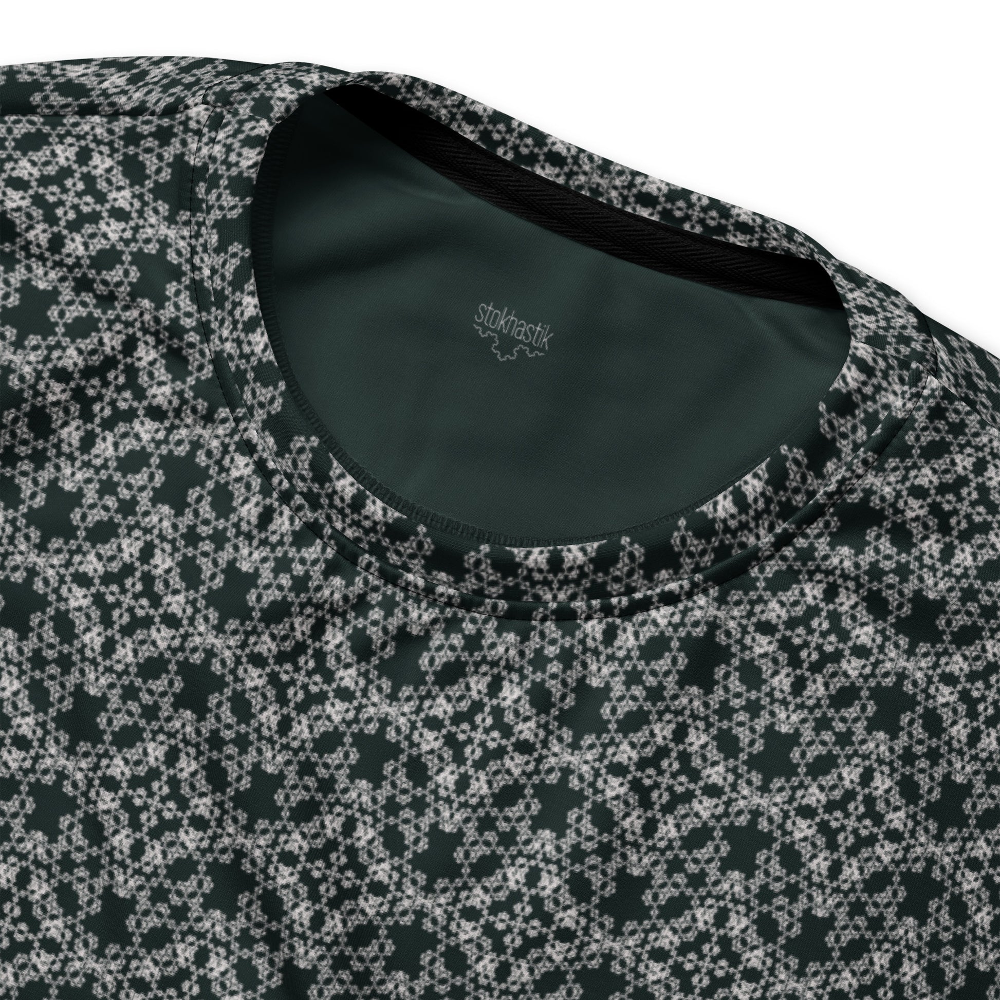 Inside label of the unisex sweatshirt with the 'Quadragon' charcoal and white fractal geometric pattern.