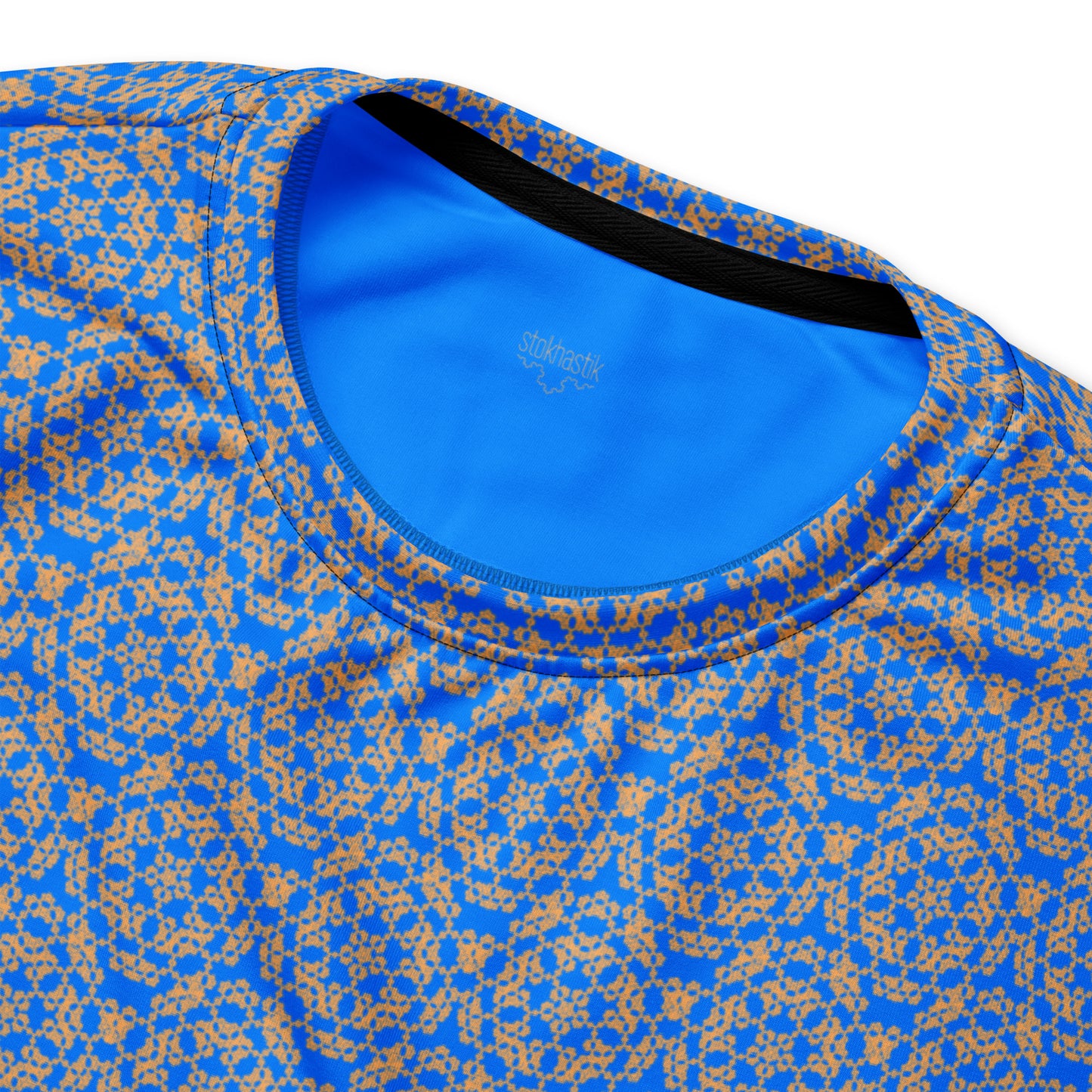 Inside label of the unisex sweatshirt with the 'Pentagon' blue and yellow fractal geometric pattern.