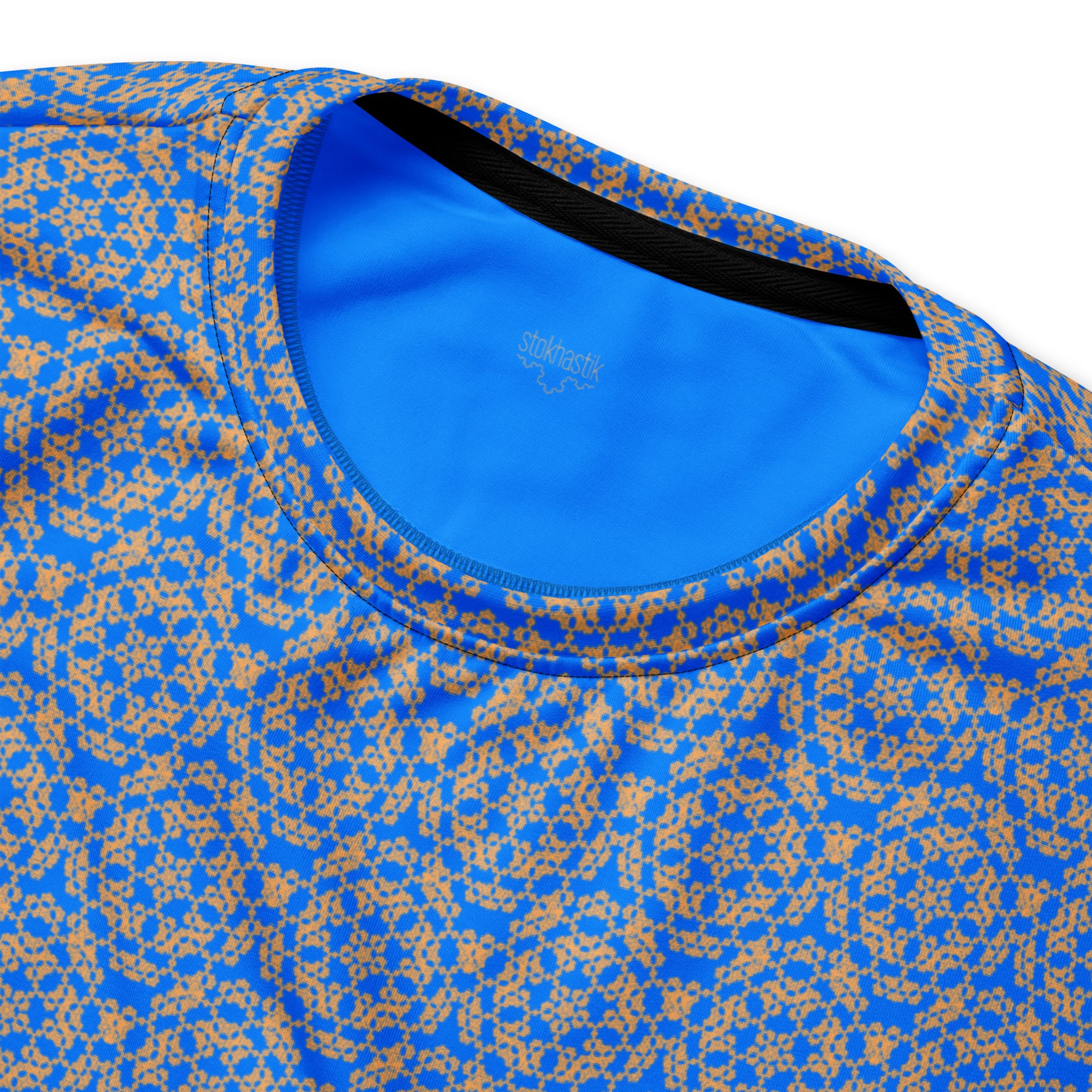 Inside label of the unisex sweatshirt with the 'Pentagon' blue and yellow fractal geometric pattern.