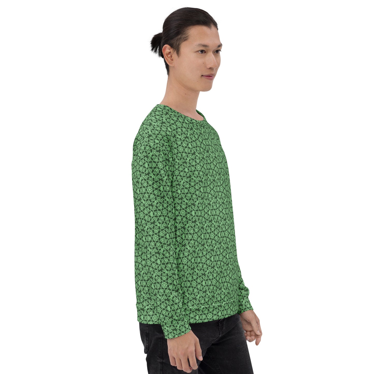 Right angle shot of a model wearing the unisex sweatshirt with the 'Heptagon' green fractal geometric pattern.