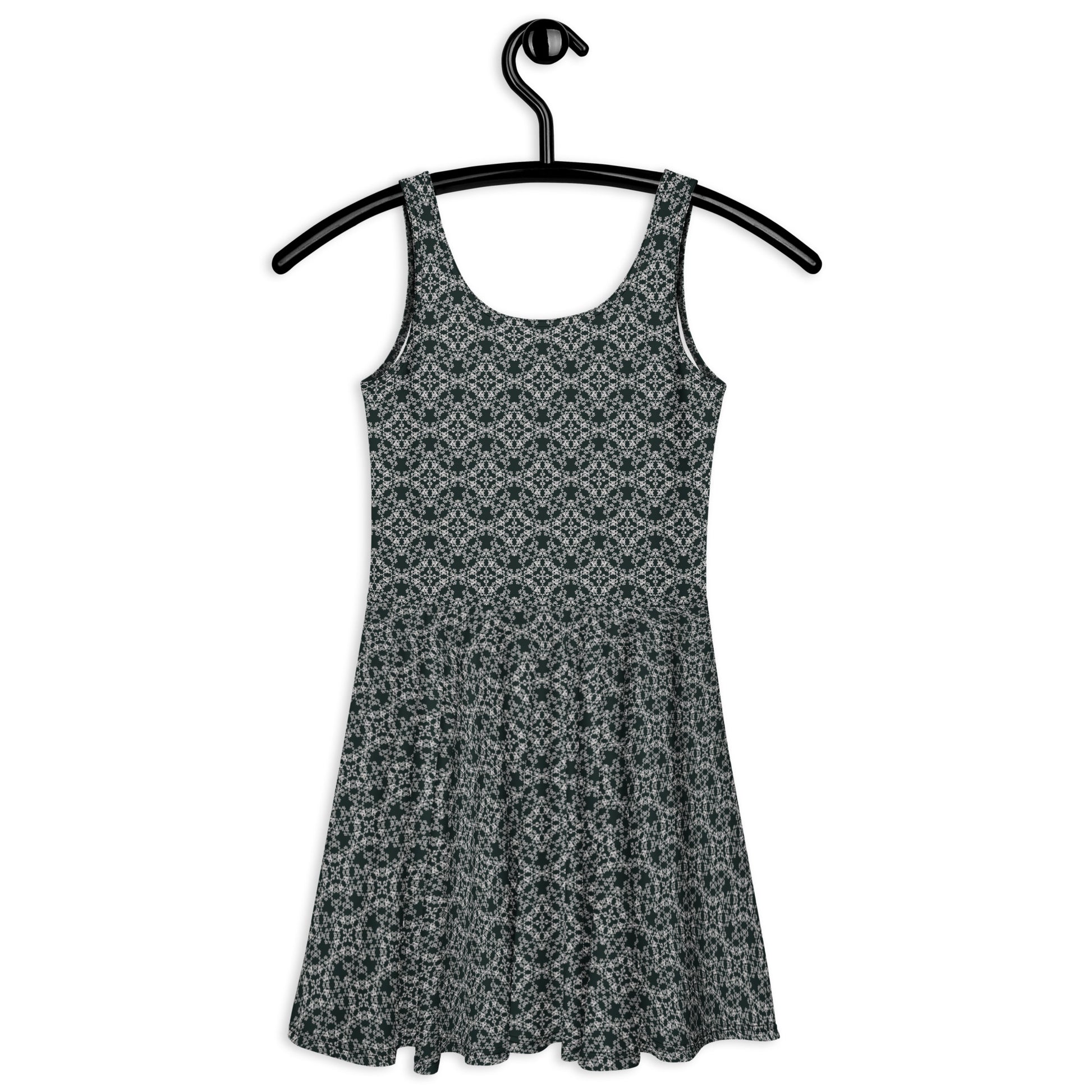 Back of the hung skater dress with the 'Quadragon' charcoal and white fractal geometric pattern.