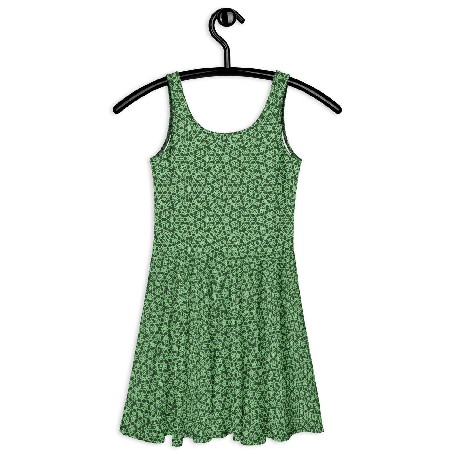 Back of the hung skater dress with the 'Heptagon' green fractal geometric pattern.