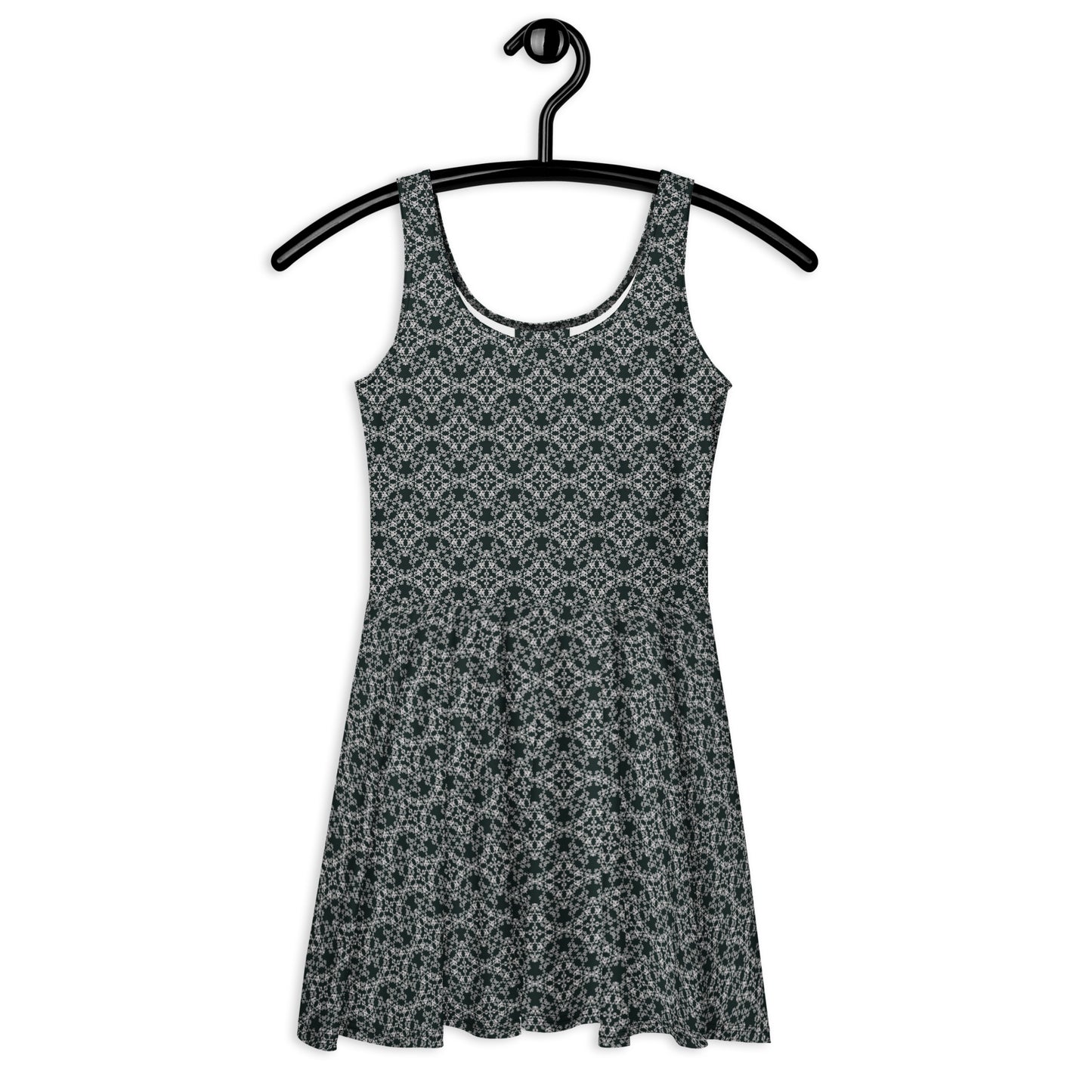 Front of the hung skater dress with the 'Quadragon' charcoal and white fractal geometric pattern.