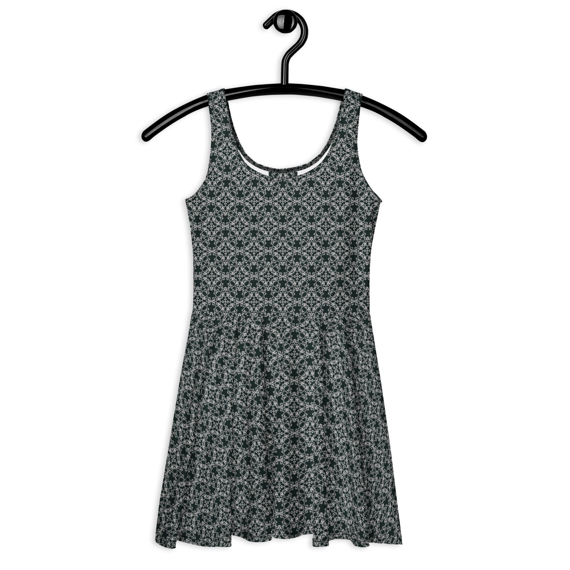 Front of the hung skater dress with the 'Quadragon' charcoal and white fractal geometric pattern.