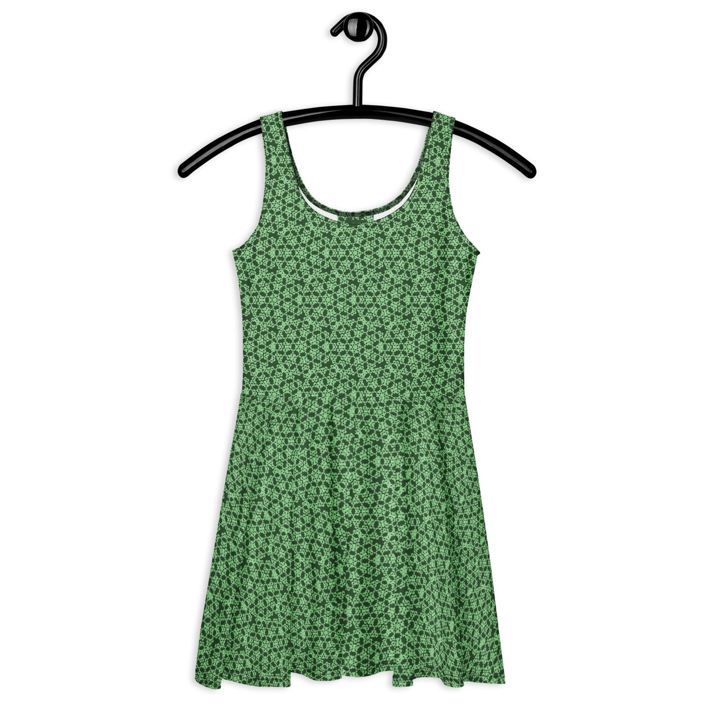 Front of the hung skater dress with the 'Heptagon' green fractal geometric pattern.