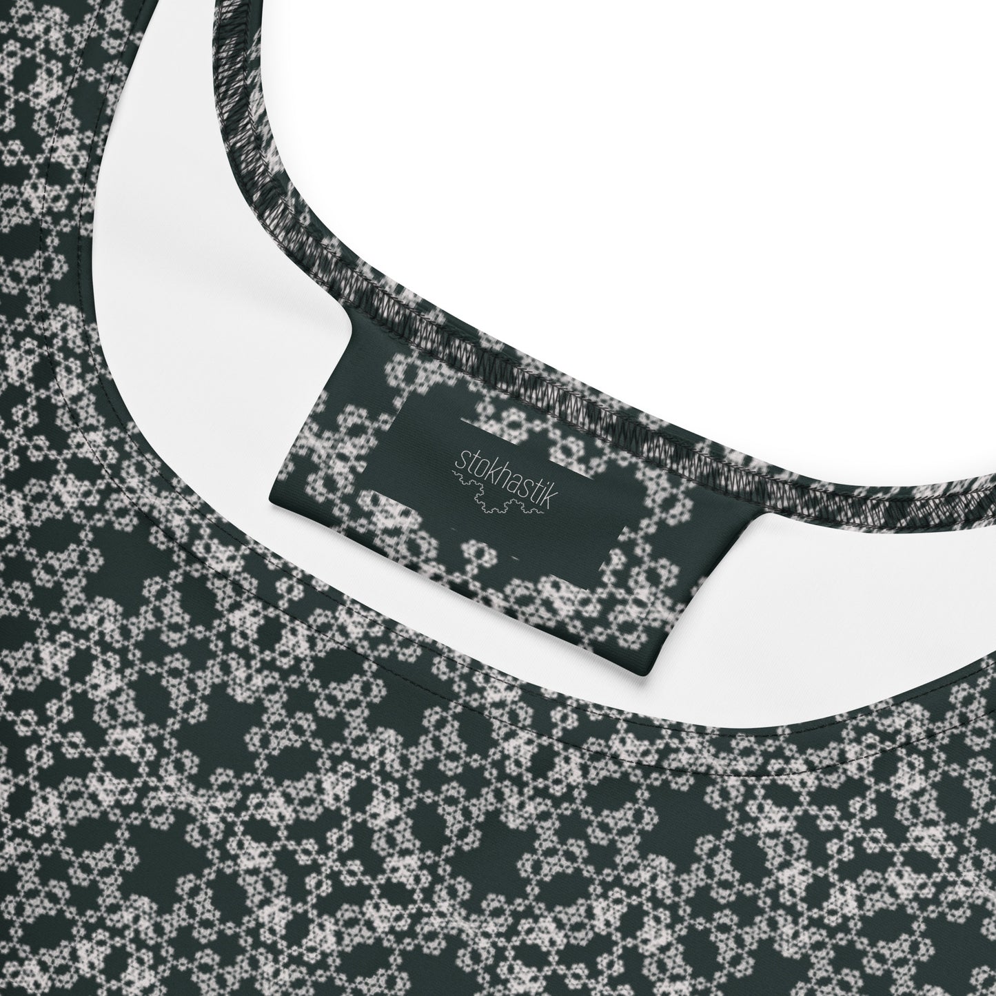 Inside label of the skater dress with the 'Quadragon' charcoal and white fractal geometric pattern.
