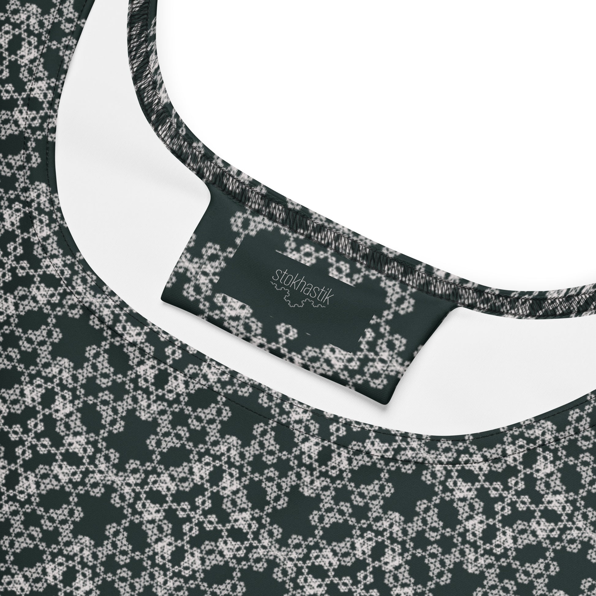 Inside label of the skater dress with the 'Quadragon' charcoal and white fractal geometric pattern.