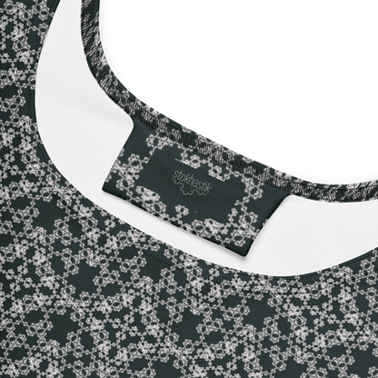Inside label of the skater dress with the 'Quadragon' charcoal and white fractal geometric pattern.