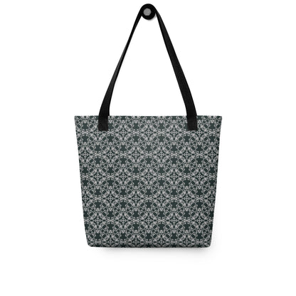 Hung tote bag with the 'Quadragon' charcoal and white fractal geometric pattern.