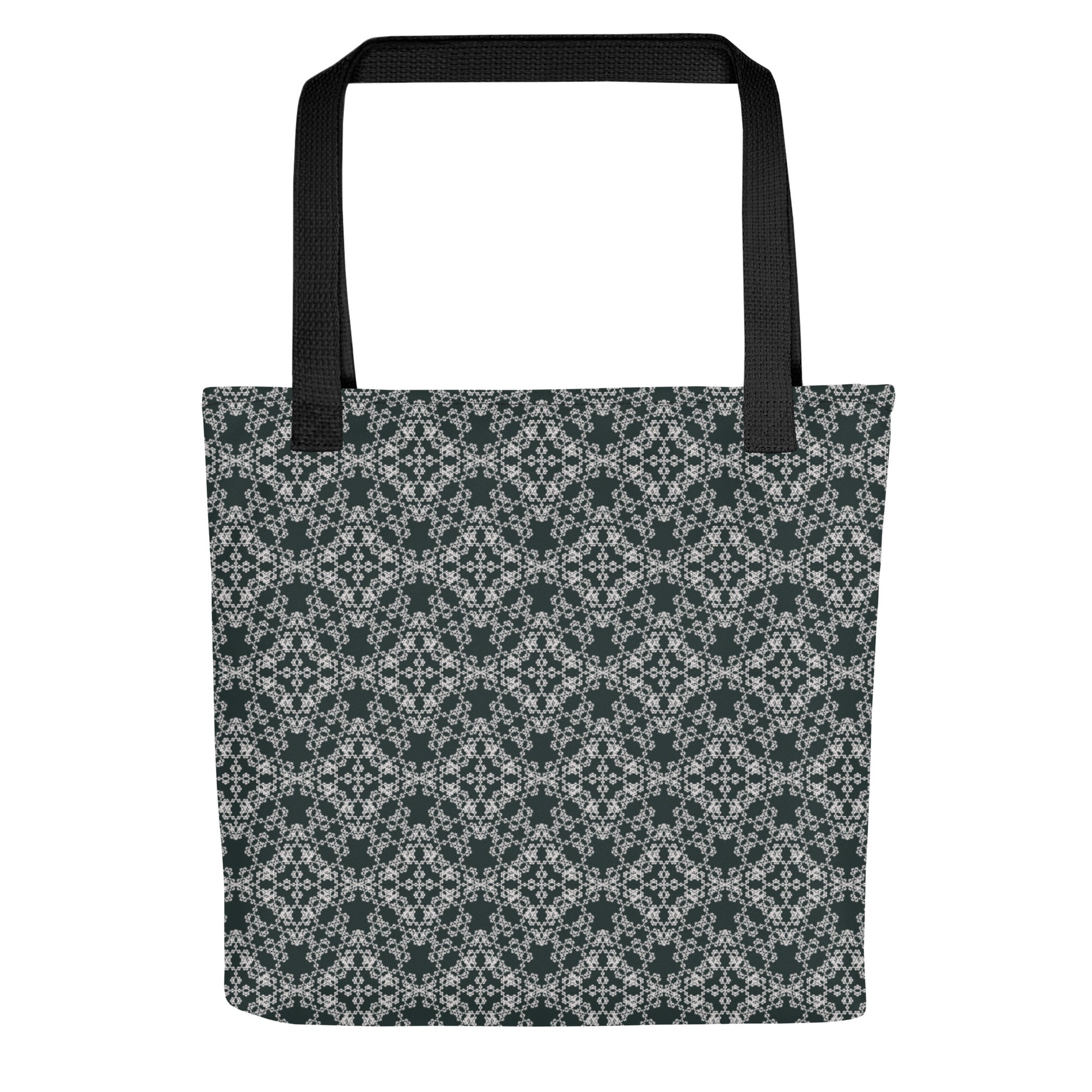 Flat shot of the tote bag with the 'Quadragon' charcoal and white fractal geometric pattern.