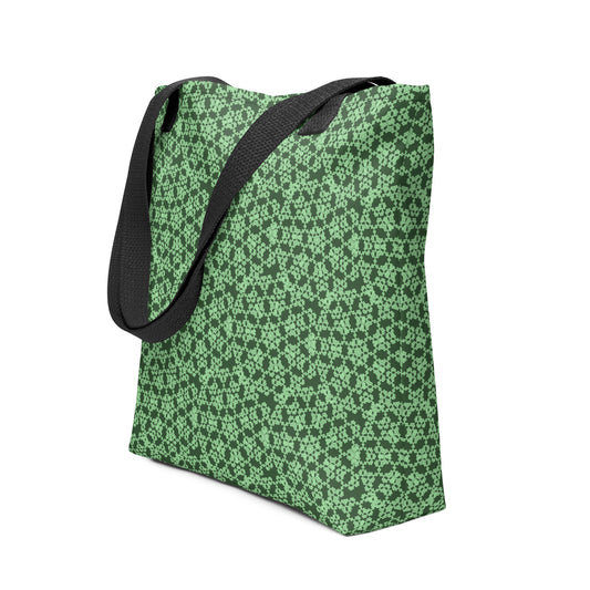 Angle shot of the tote bag with the 'Heptagon' green fractal geometric pattern.