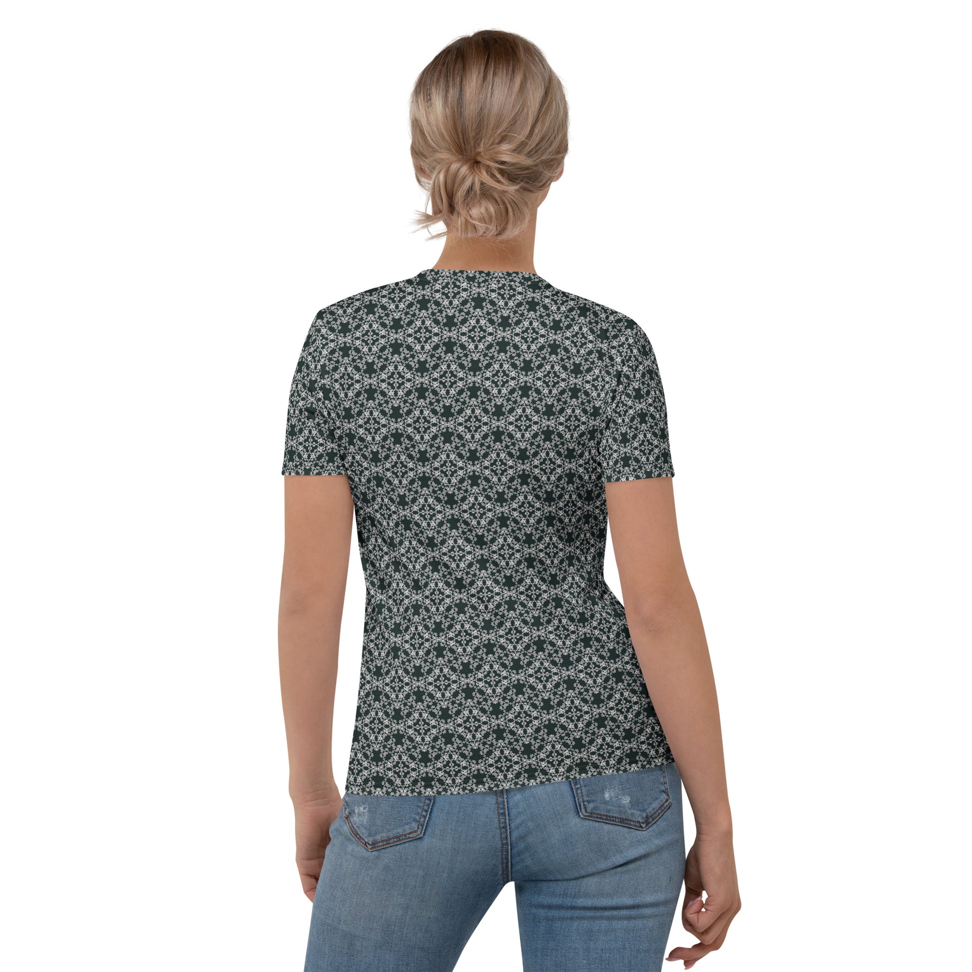 Back shot of a young woman wearing women's t-shirt with the 'Quadragon' charcoal and white fractal geometric pattern.